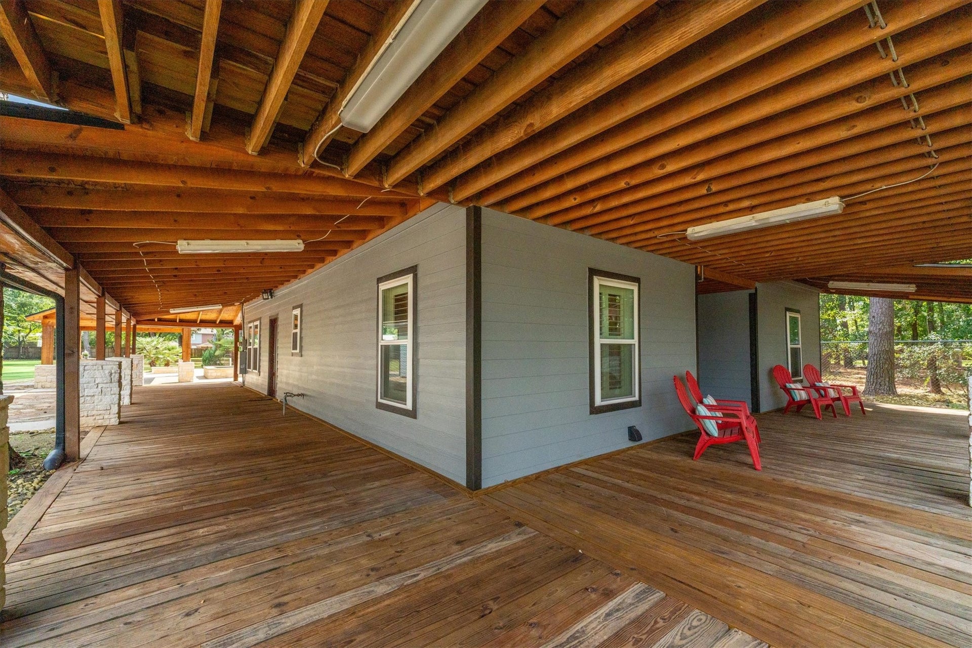 7119 Poole Road, Spring, TX 77379 Imagine rocking chairs and a picnic table around this porch.