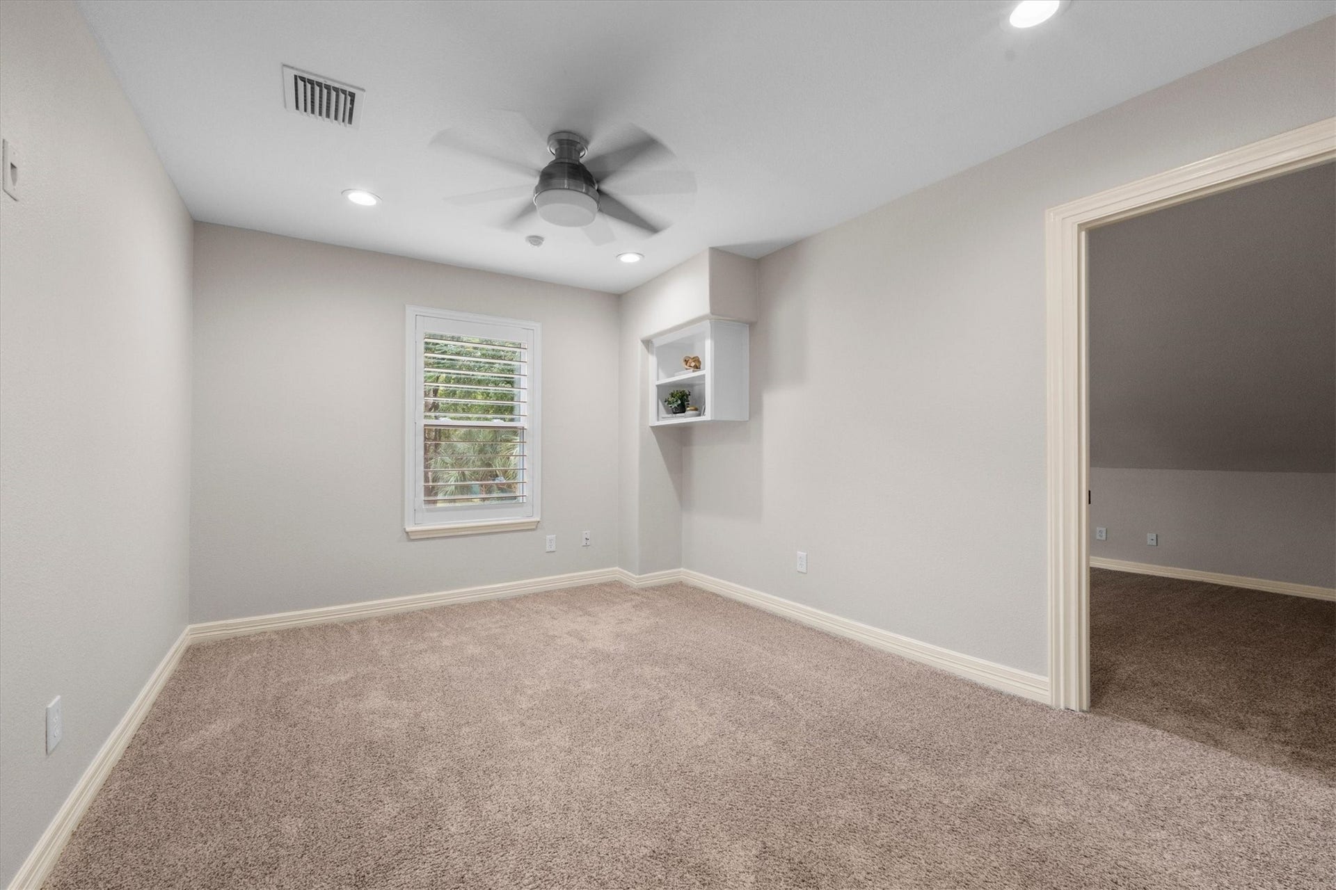 7119 Poole Road, Spring, TX 77379 Secondary Bedroom 3 has a great view of the pool and is attached to the media room.