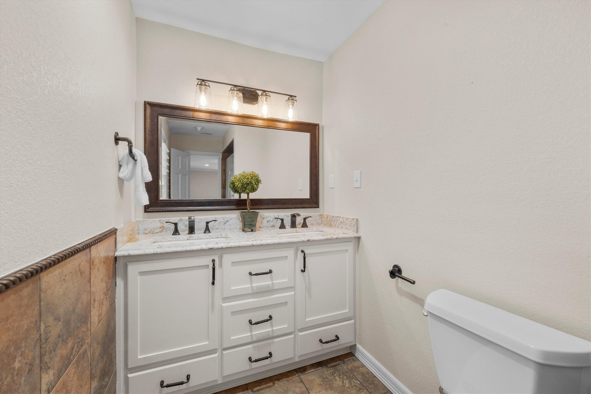 7119 Poole Road, Spring, TX 77379 The primary bathroom was updated in 2020 with a custom dual sink vanity and large walk in shower.