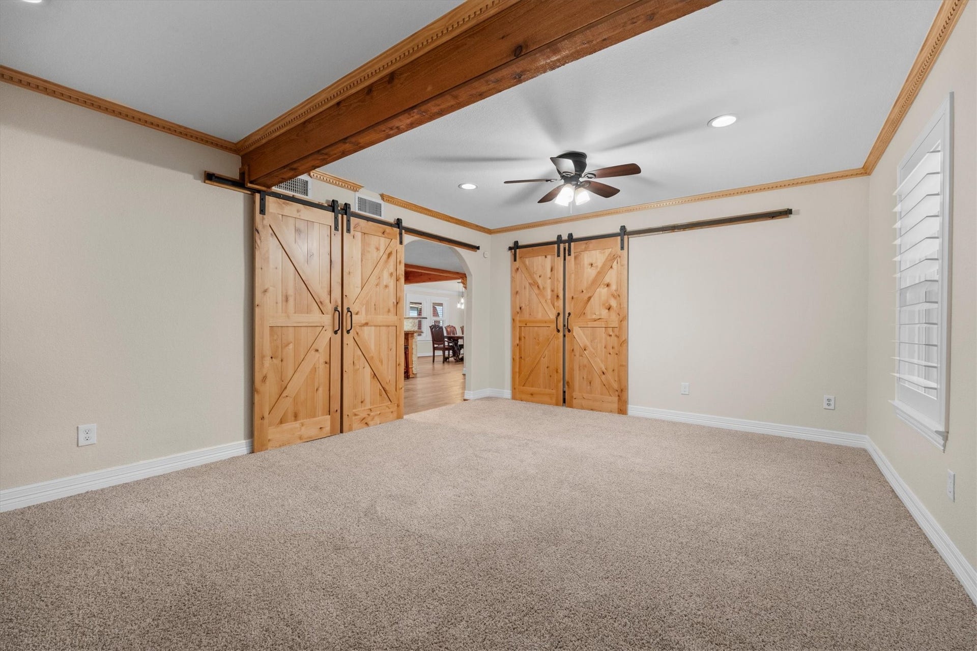 7119 Poole Road, Spring, TX 77379 The barn doors blend seamlessly into the design.