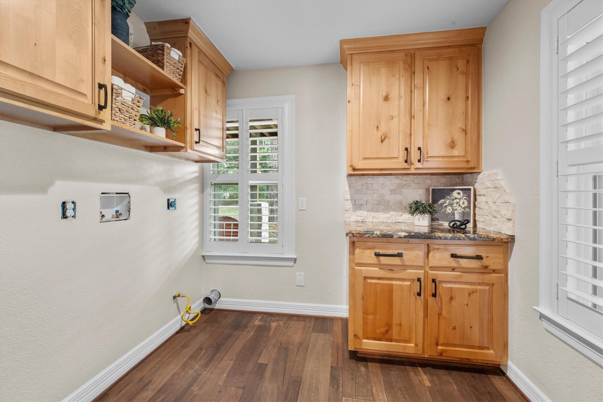 7119 Poole Road, Spring, TX 77379 The downstairs laundry room has ample storage and the same charm as the rest of the home.