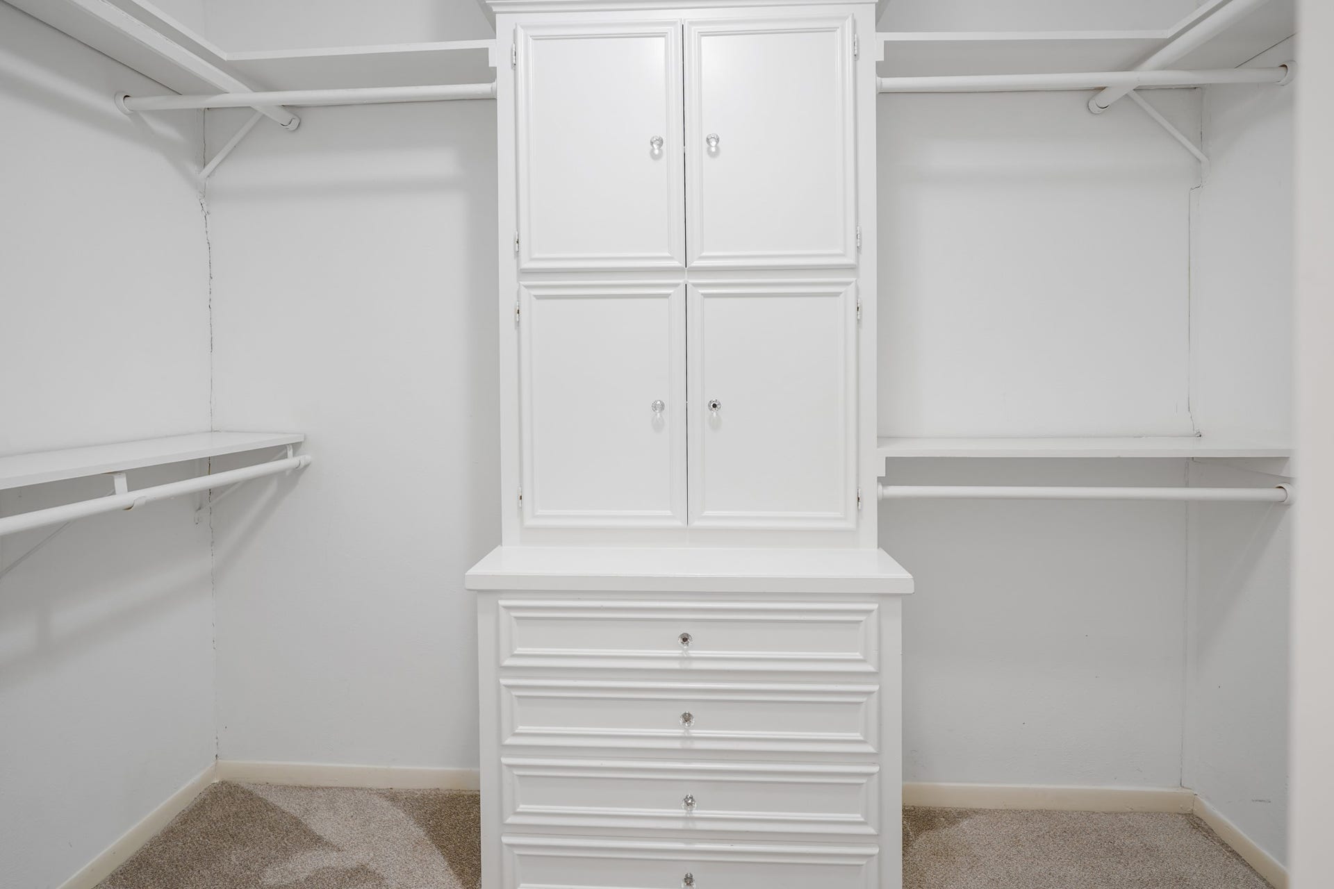 2102 Oak Shores Drive, Houston, TX 77339 Primary closet with built-ins.
