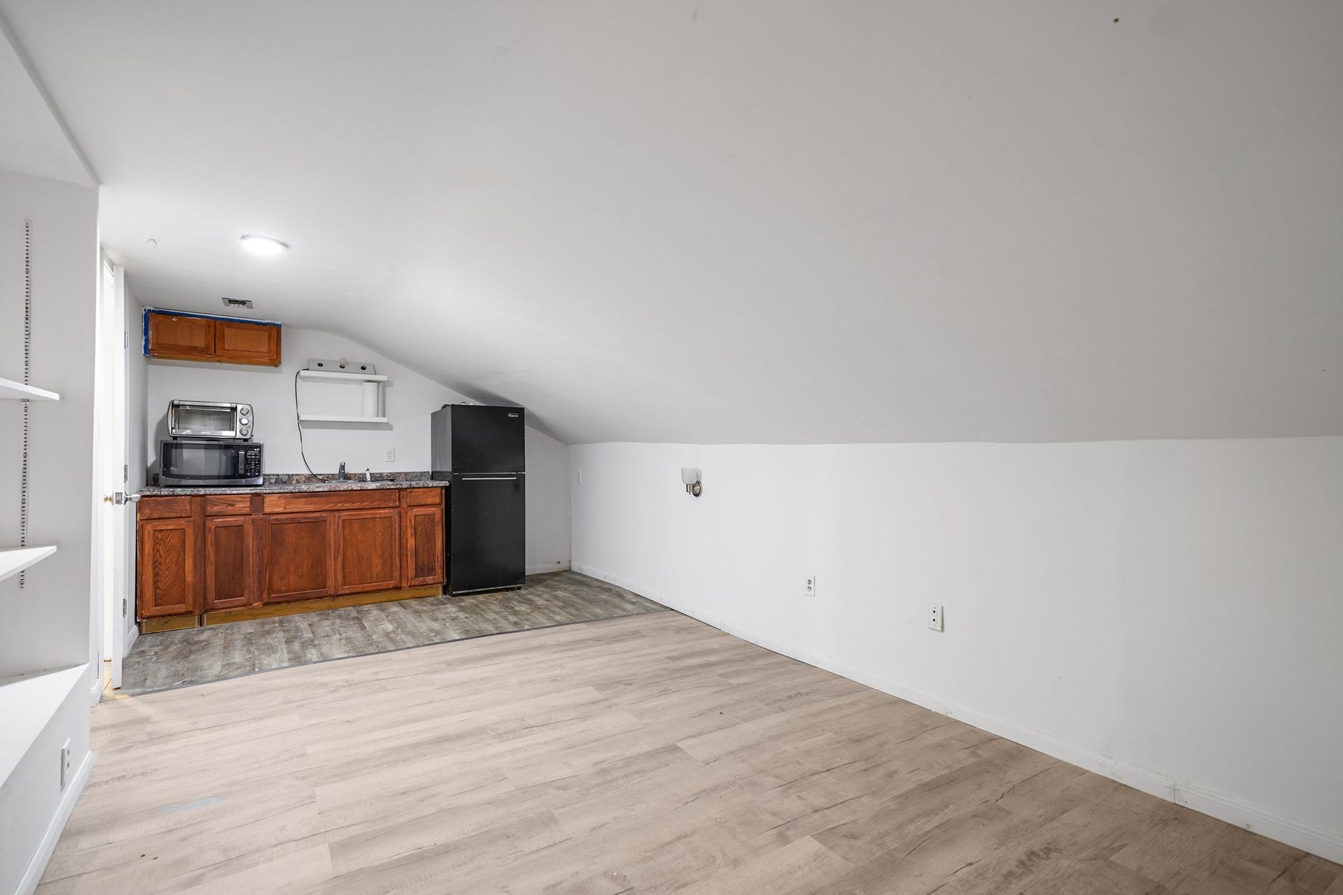 2102 Oak Shores Drive, Houston, TX 77339 Upstairs apartment kitchen area and living room.