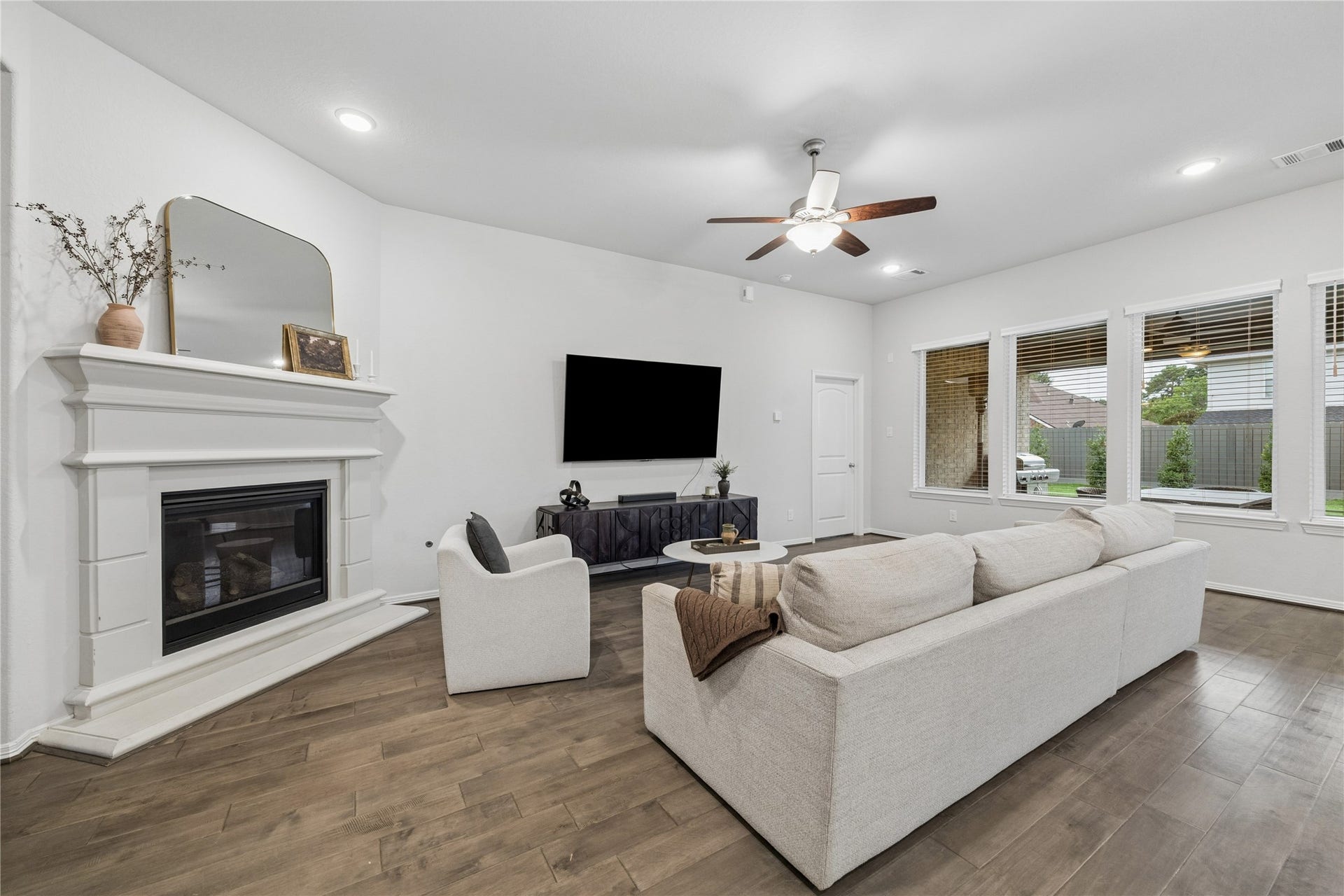 14231 Archer County Trail, Cypress, TX 77429 Gas-log fireplace, stone hearth. high ceilings.