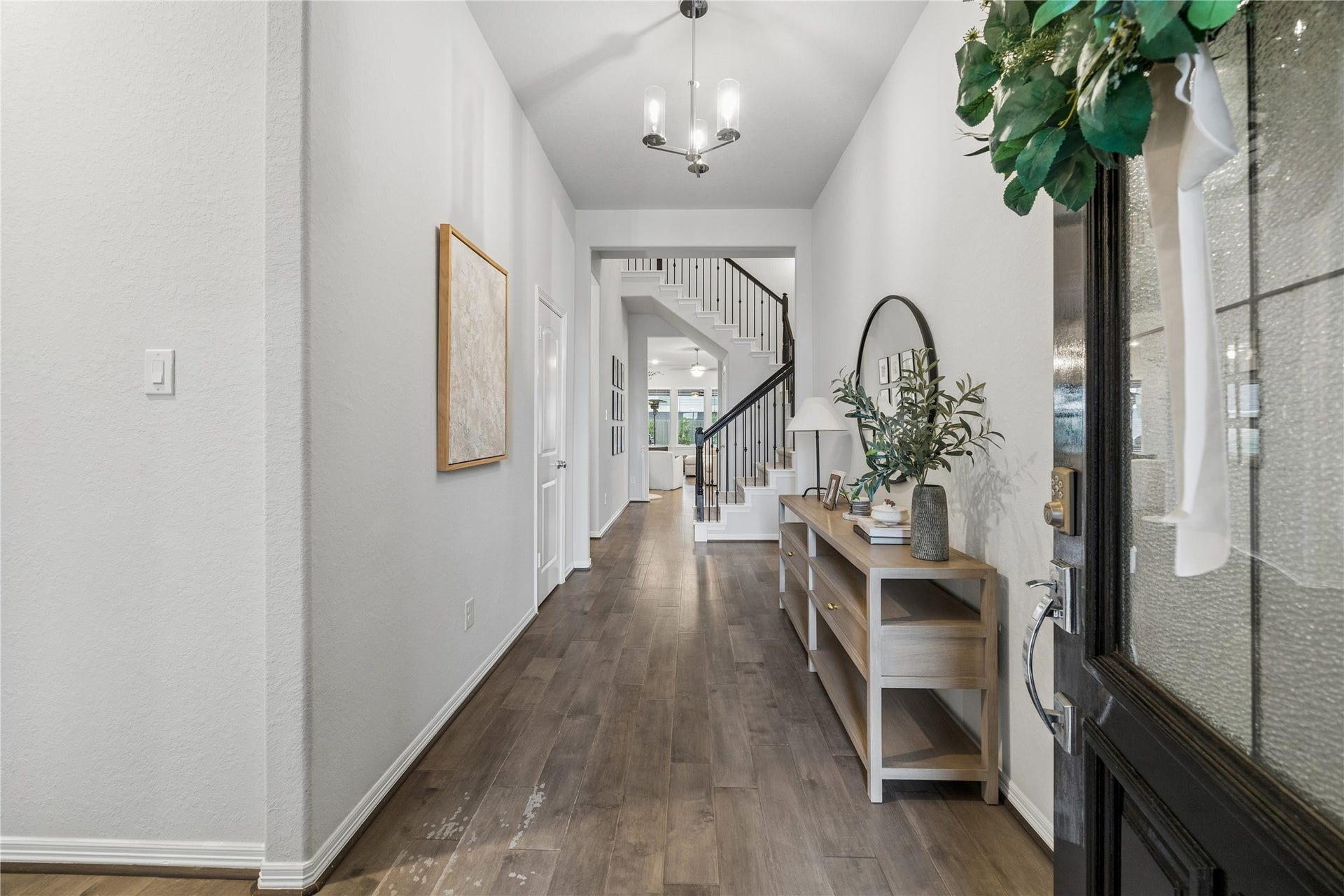 14231 Archer County Trail, Cypress, TX 77429 formal entry, tall ceilings, engineered wood floors, designer lighting, perfect dimensions.
