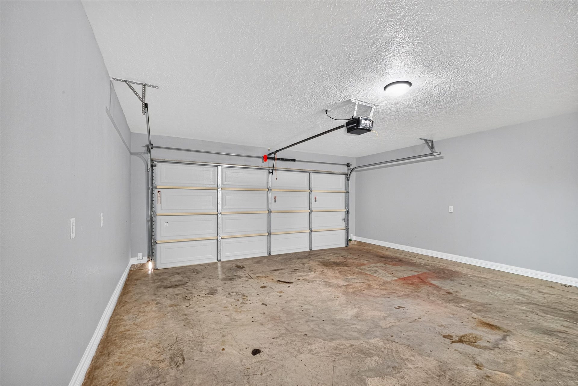 803 Avenue K, South Houston, TX 77587 Spacious two-car garage with an automatic door opener.