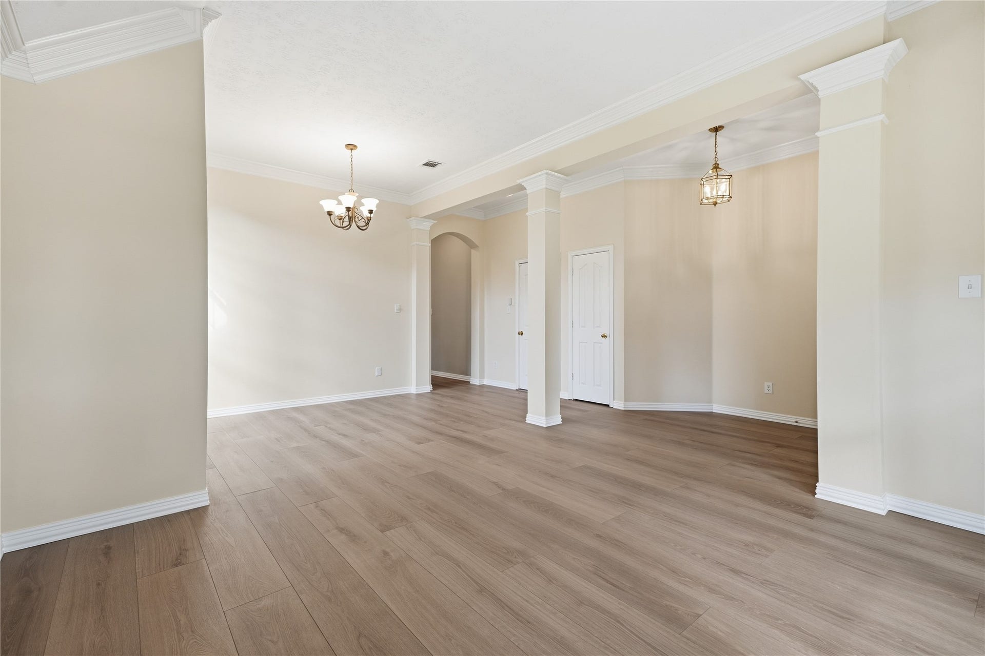 1411 Pebble Banks Lane, Seabrook, TX 77586 This view from the formal living shows the amount of space to make an inviting main living area.
