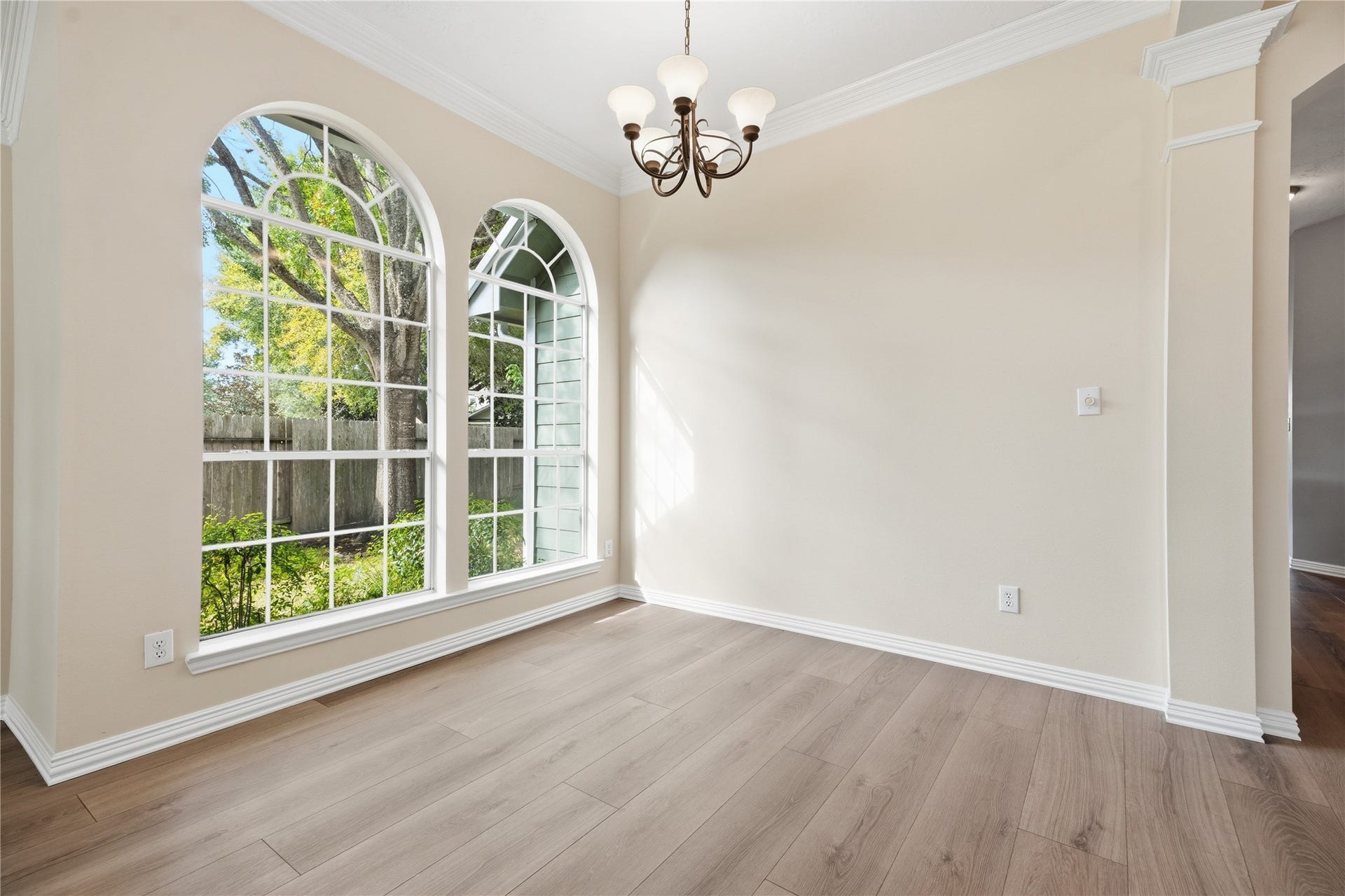 1411 Pebble Banks Lane, Seabrook, TX 77586 Crown molding accentuates the formal dining space.