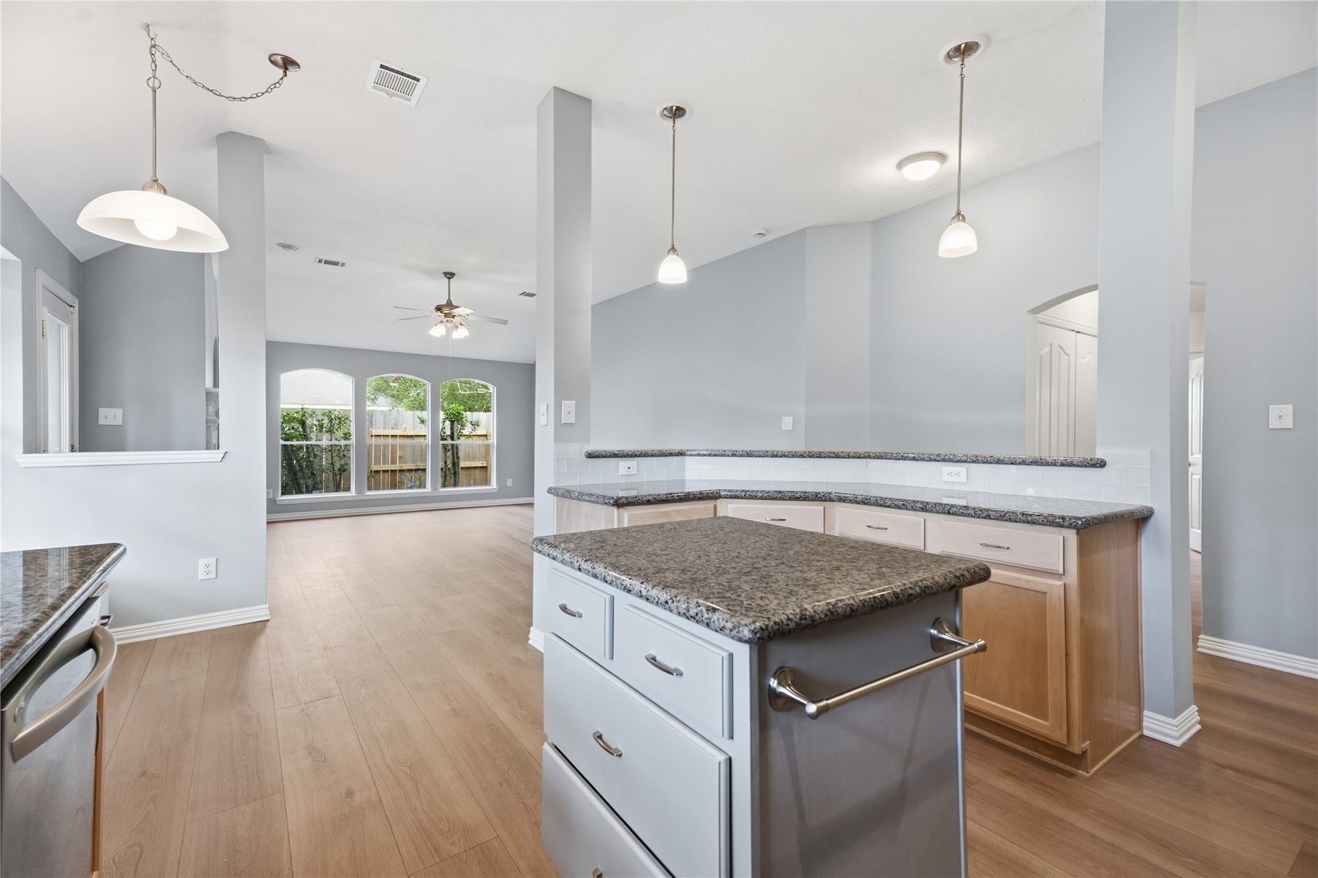 1411 Pebble Banks Lane, Seabrook, TX 77586 Pendant lighting illuminates the spacious bar.