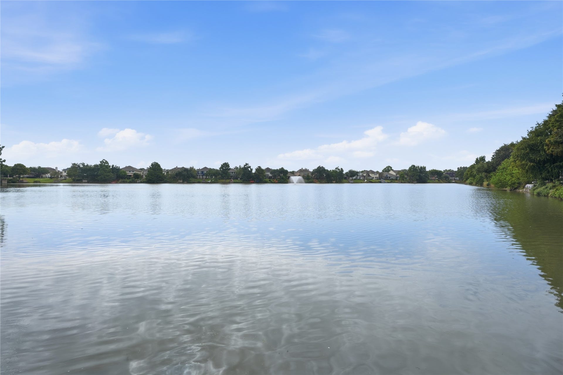 1411 Pebble Banks Lane, Seabrook, TX 77586 Tranquil neighborhood lake view from the park
