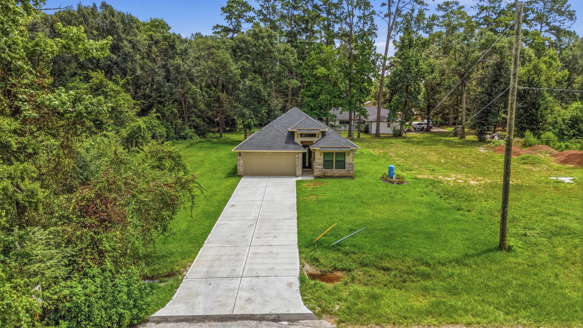 23620 Youpon Lane, Spring, TX 77389 Enjoy added privacy with a beautifully positioned home surrounded by trees