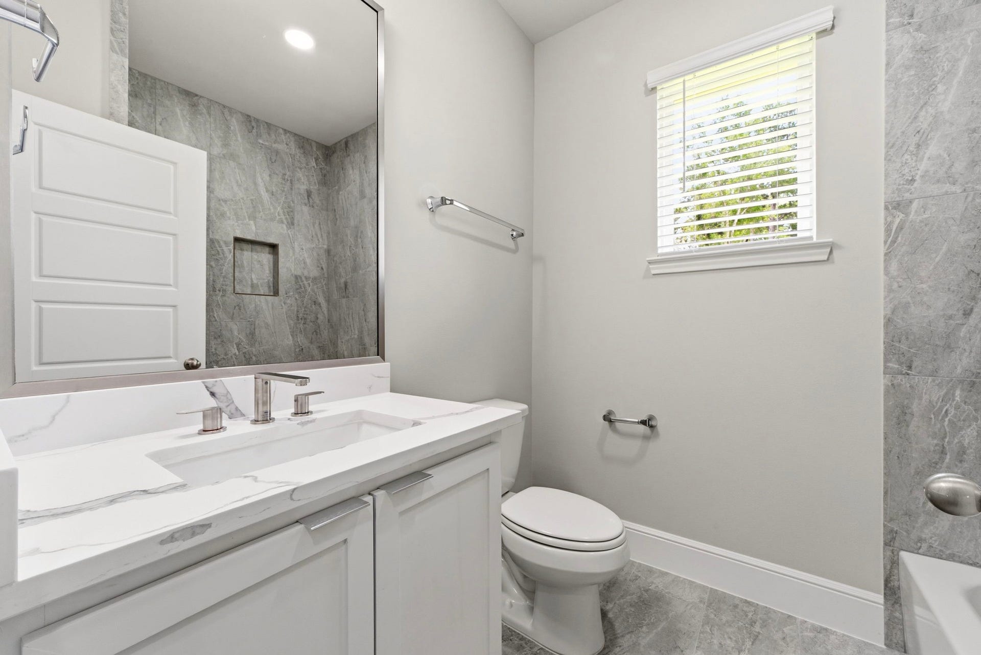 23620 Youpon Lane, Spring, TX 77389 Modern Secondary Baths feature quartz countertops and stylish finishes