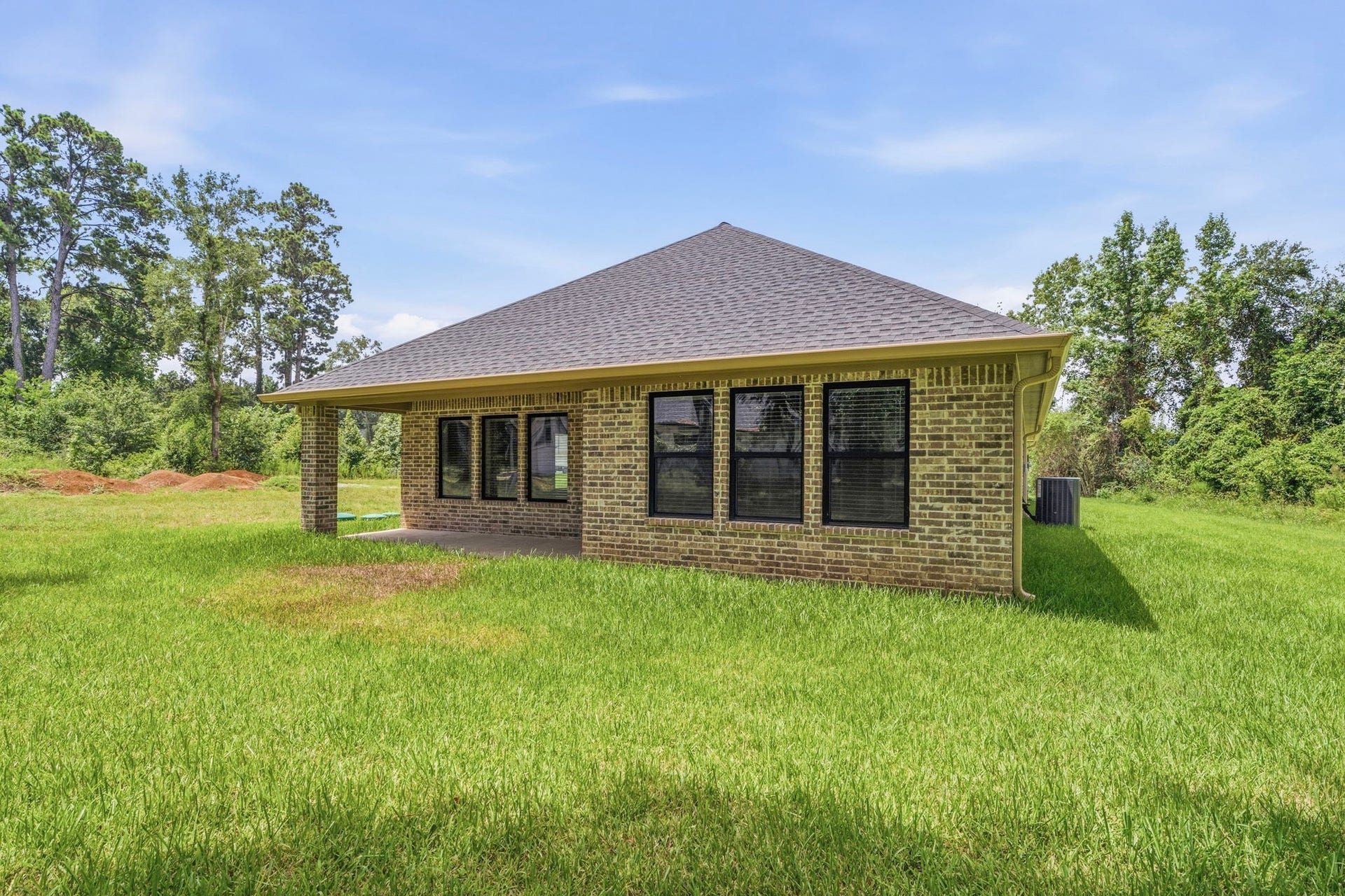 23620 Youpon Lane, Spring, TX 77389 This sturdy home features a timeless facade that provides excellent insulation and structural integrity.
