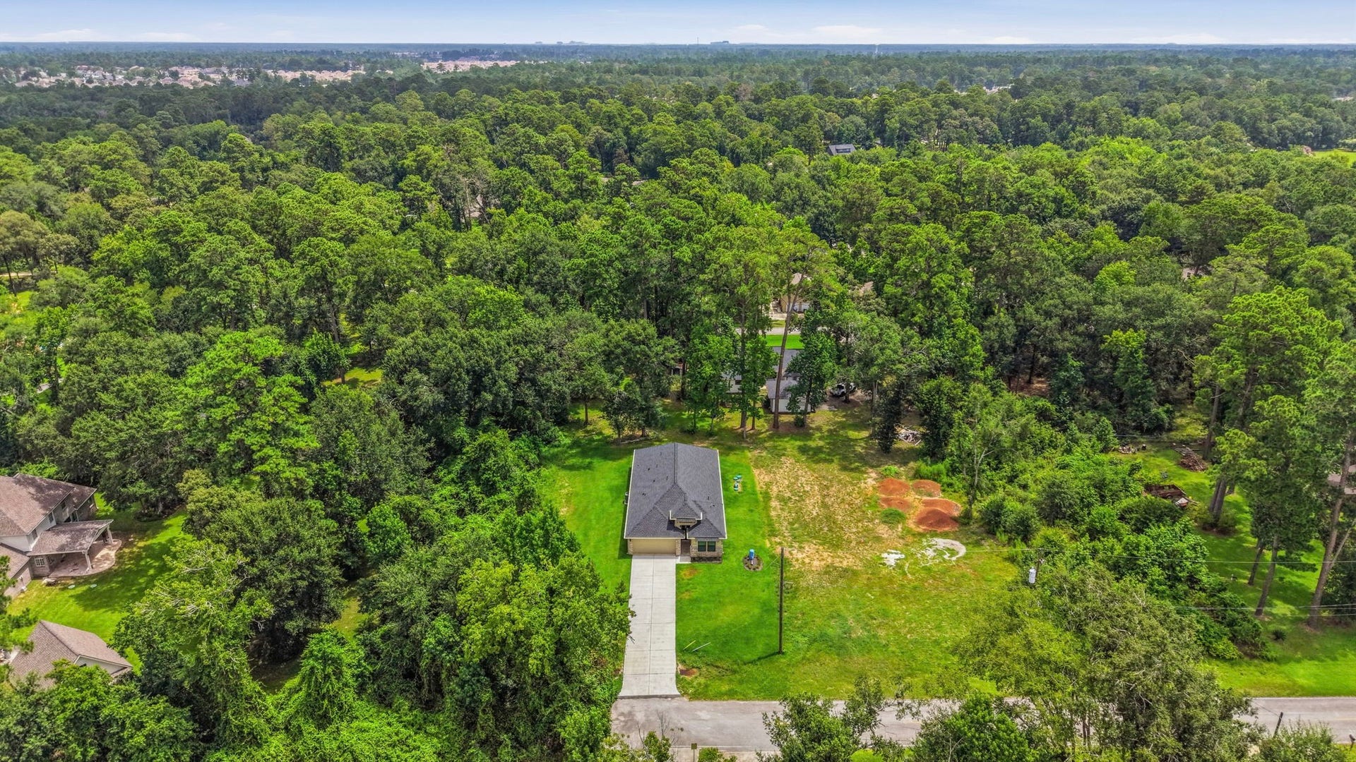 23620 Youpon Lane, Spring, TX 77389 A rare blend of privacy, natural beauty, and modern living