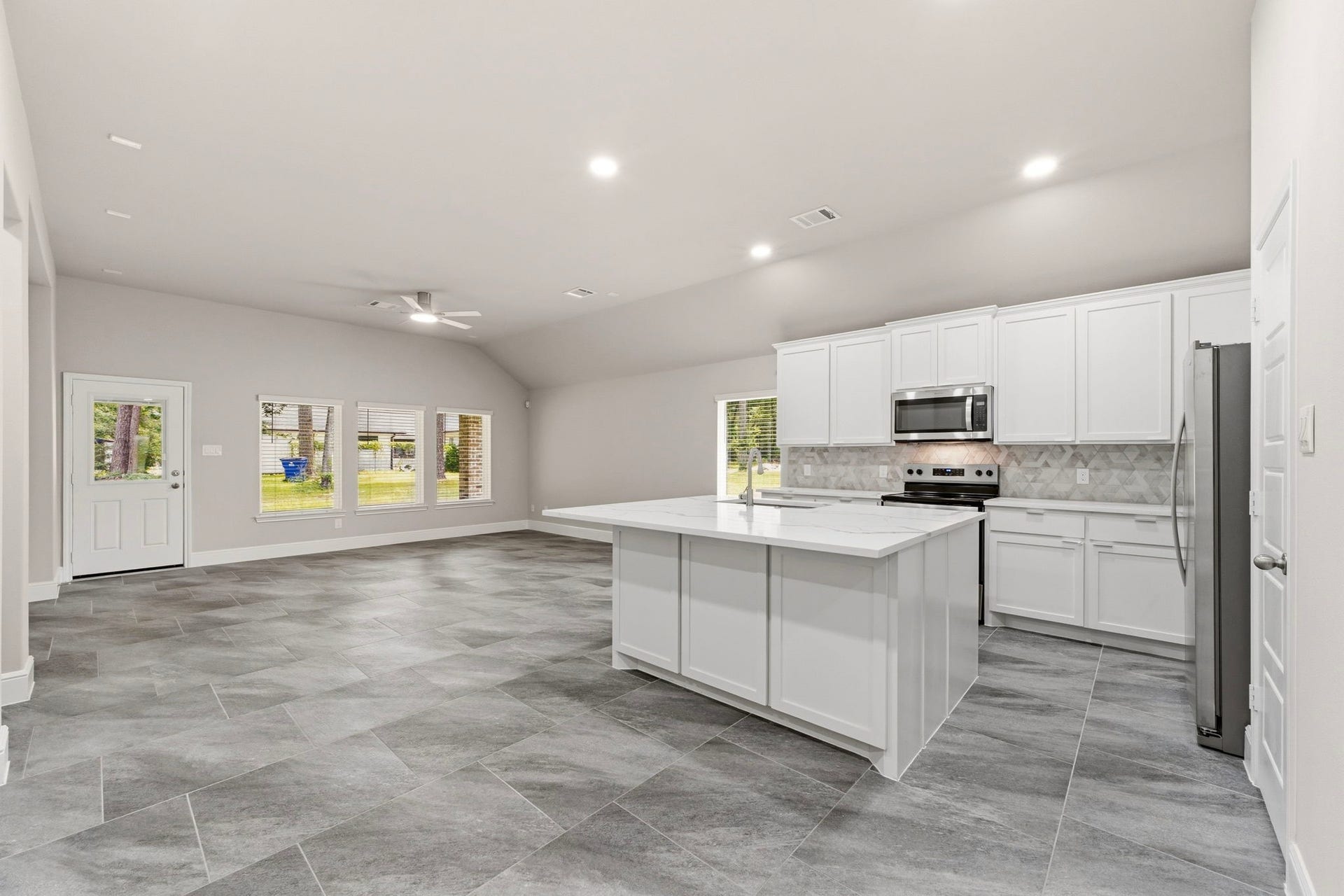 23620 Youpon Lane, Spring, TX 77389 Open concept layout features lots of windows for natural light