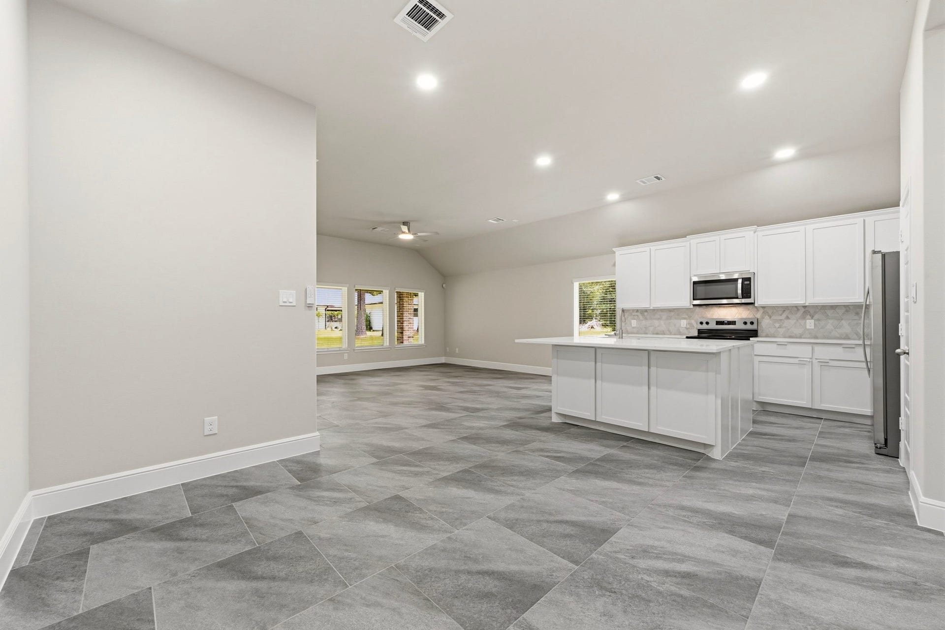 23620 Youpon Lane, Spring, TX 77389 Dining area open to the kitchen & family room, creating a light-filled flow perfect for entertaining and everyday living