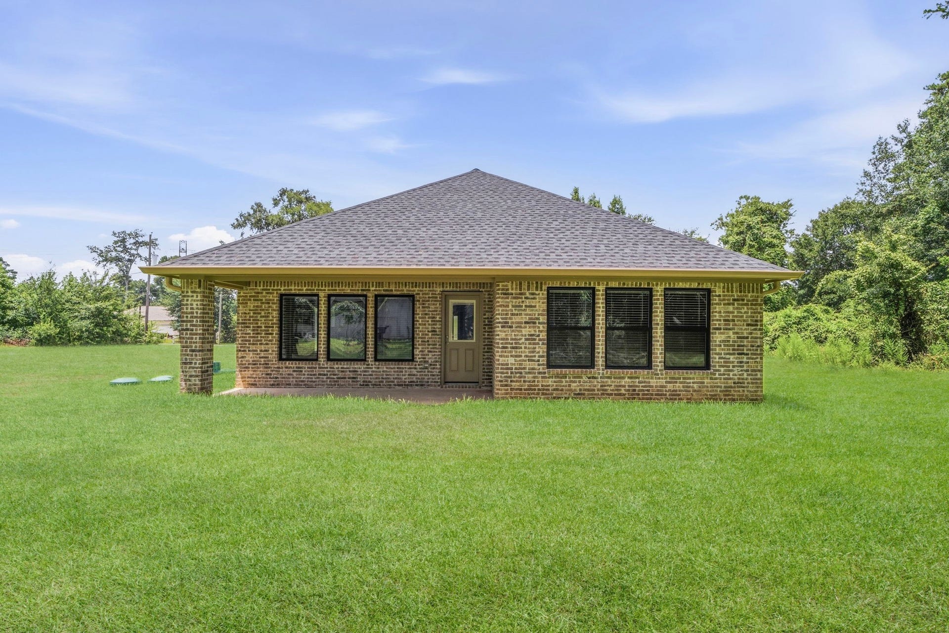 23620 Youpon Lane, Spring, TX 77389 Fully bricked exterior offering classic curb appeal, durability, and low-maintenance living.