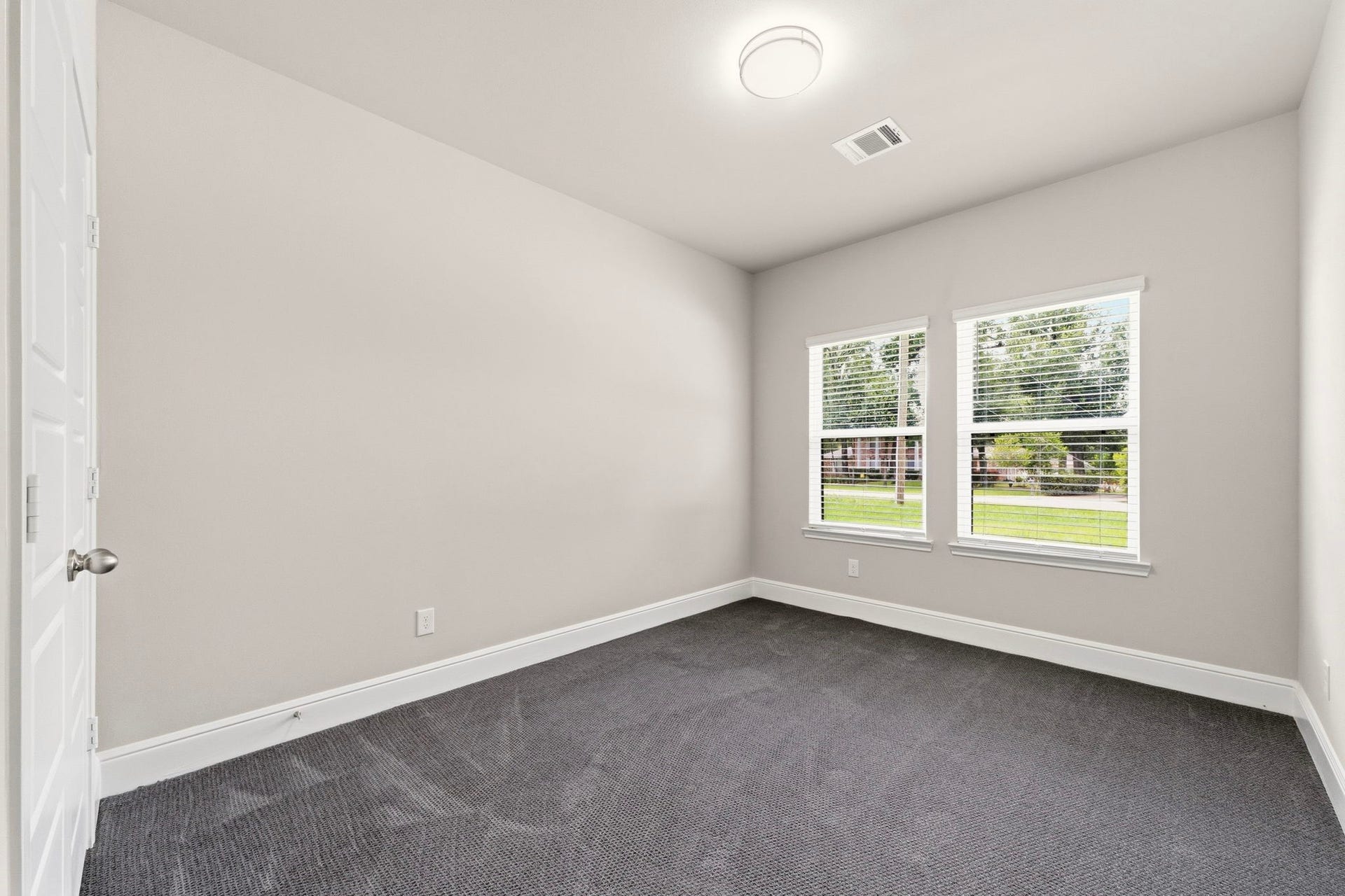 23620 Youpon Lane, Spring, TX 77389 Spacious secondary bedrooms feature lots of natural light and carpet for added comfort.
