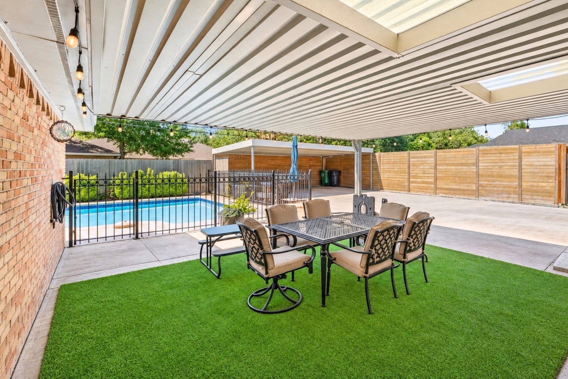 11006 Ashcroft Drive, Houston, TX 77096 Covered turf for outdoor gathering, dining and kids play