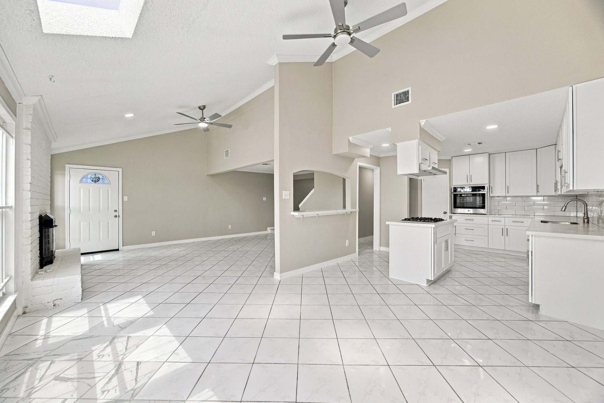 Open concept layout offers so many possibilities! Beautiful floors, fresh interior paint throughout, AND a COMPLETELY REMODELED KITCHEN. Every homeowners dream!