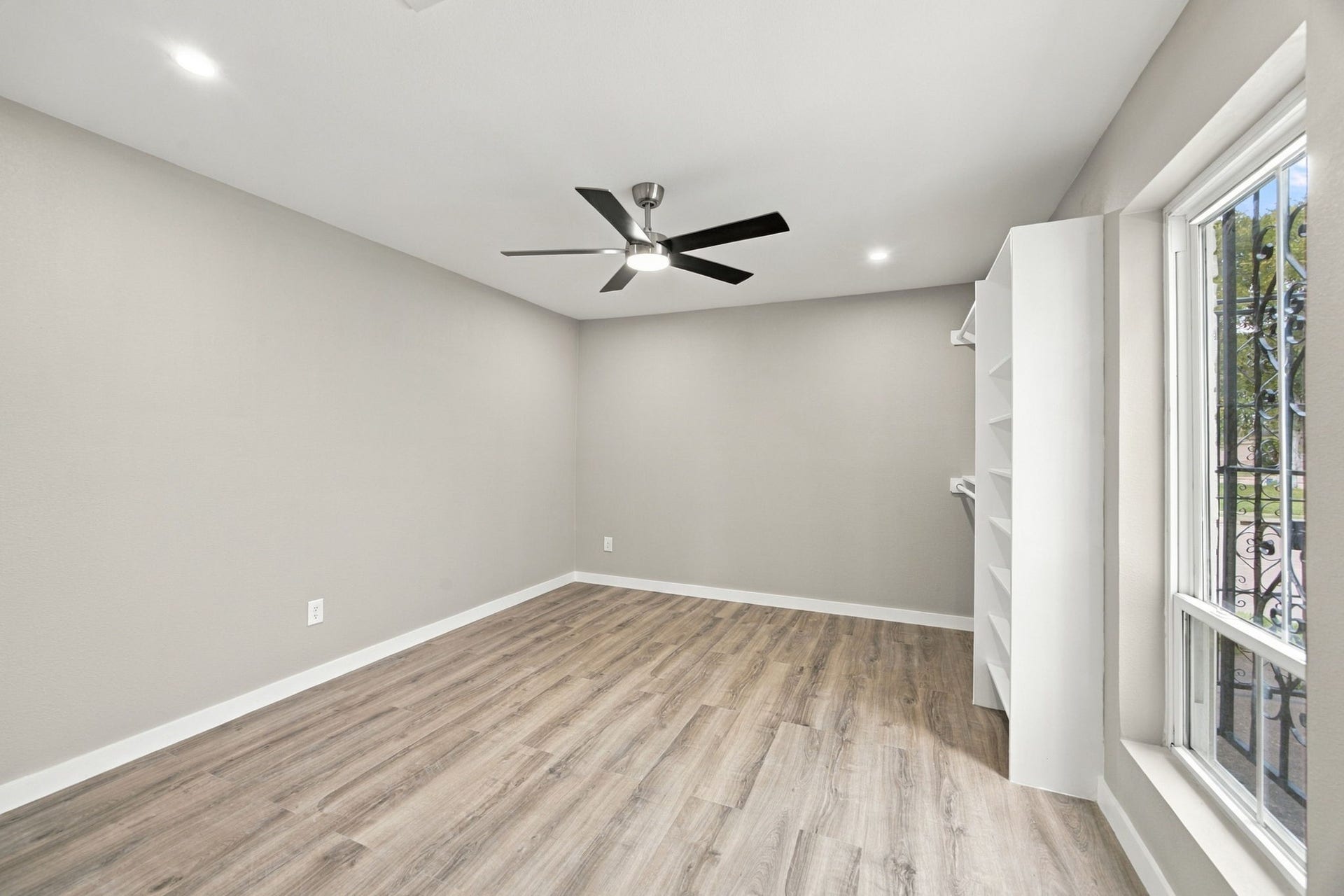 Bedroom #3 - Check out those beautiful laminate light-colored floors. Spectacular contemporary feel!