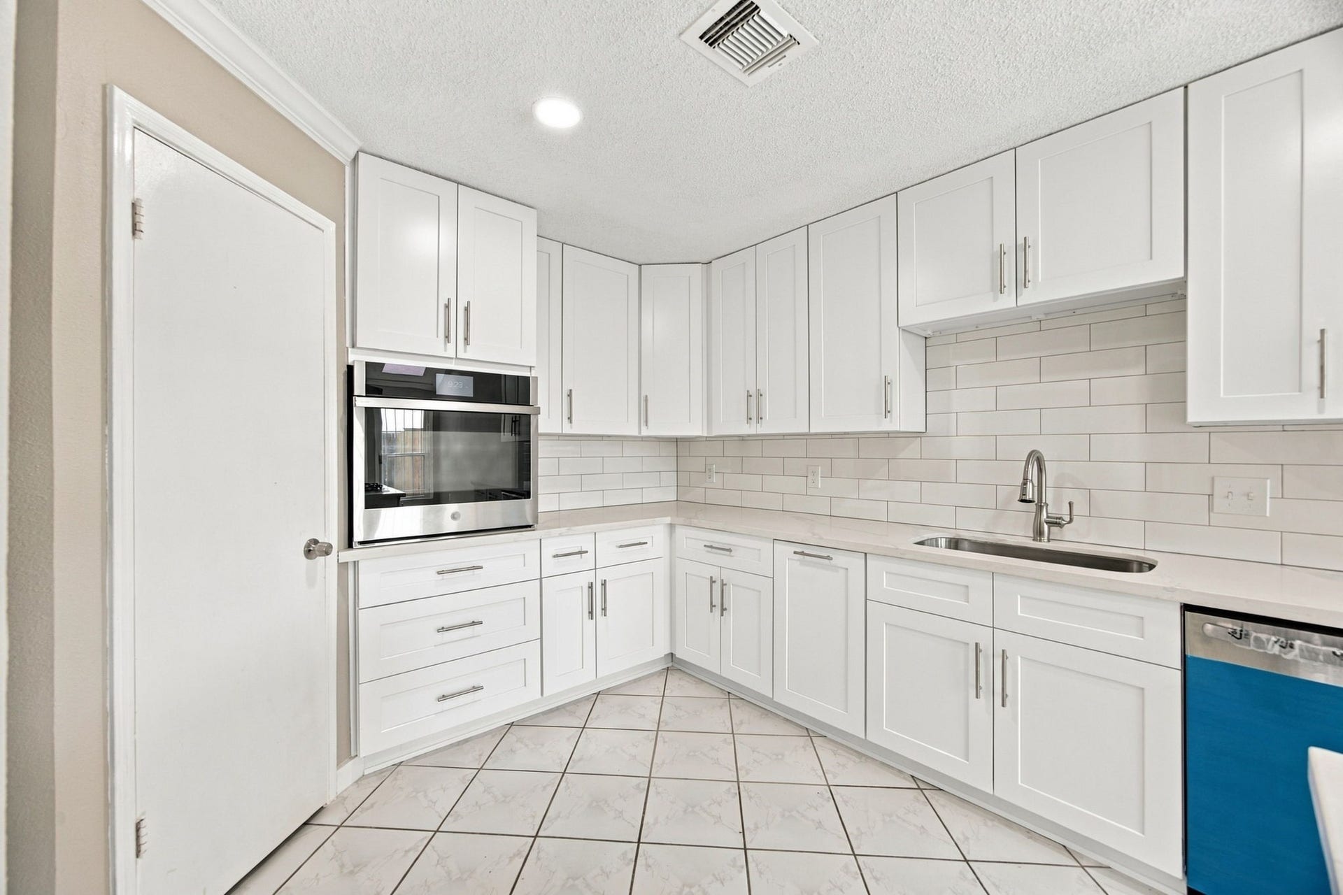 Enjoy the NEW Appliances along with tons of cabinet space and gorgeous quartz countertops!