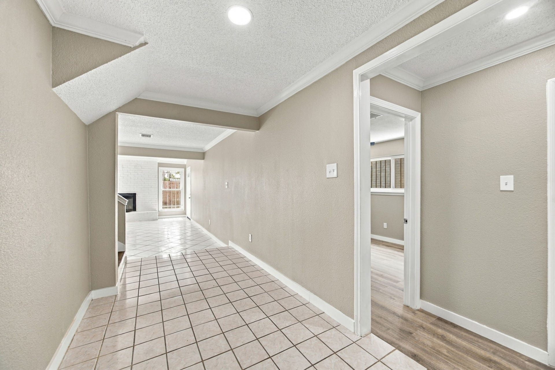 Walk-in to bright neutral colors and beautiful flooring that welcome you right in.
