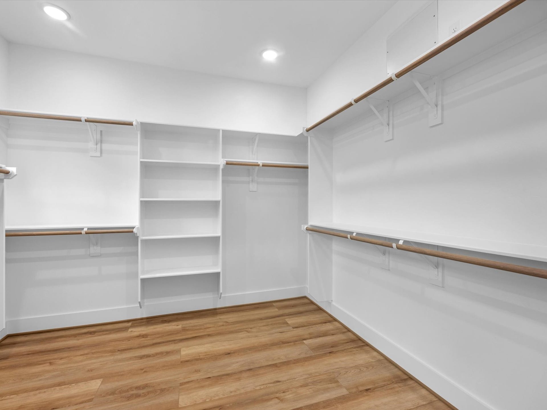 4804 Elysian St, #A/B, Houston, TX 77009 Spacious walk-in closet for primary bedroom offering plenty of room for clothing, shoes, and accessories. The generous size provides excellent storage while keeping everything organized and easily accessible.
