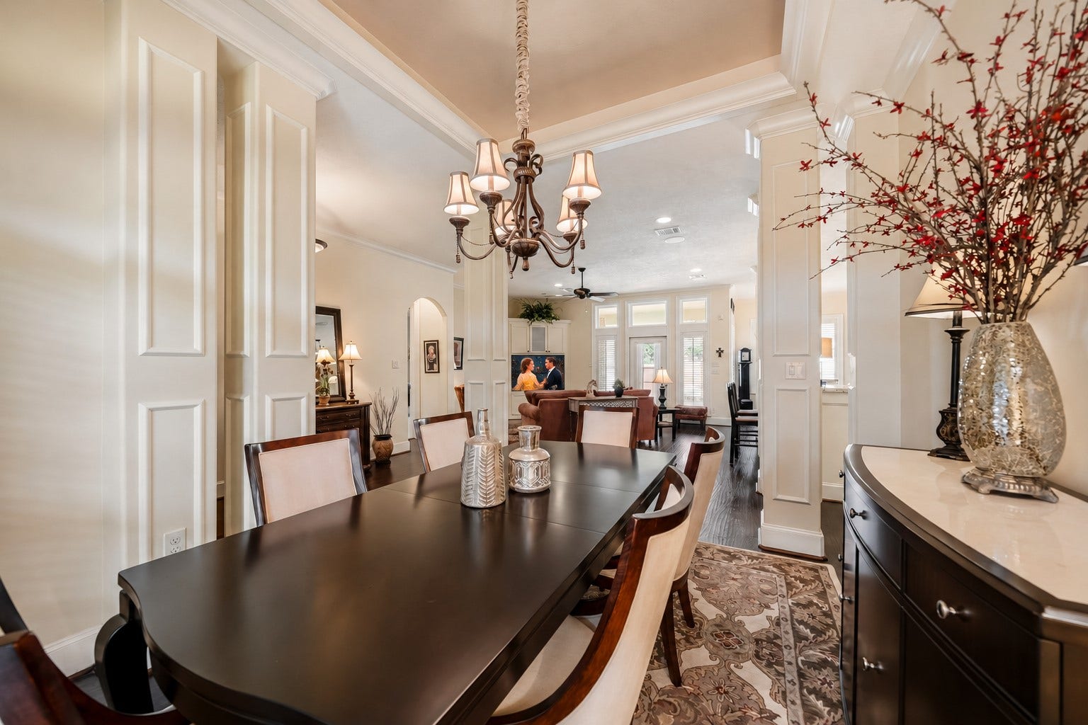 4631 Lake Village Drive, Fulshear, TX 77441 The Dining Room enjoys seamless sightlines into the Family Room and Kitchen, fostering an effortless connection between each gathering space. Whether hosting holiday celebrations or intimate dinners, conversation and laughter can flow freely throughout the home's thoughtfully designed open layout.