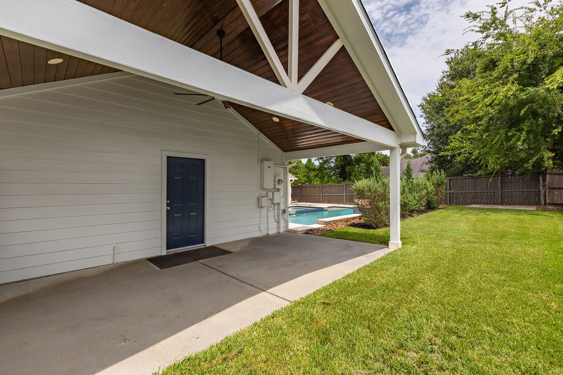12830 Point Aquarius Boulevard, Willis, TX 77318 Newly built addition to the garage. Can be used as golf cart parking or boat parking if you do not want to leave at the boat slip included with the monthly rental.