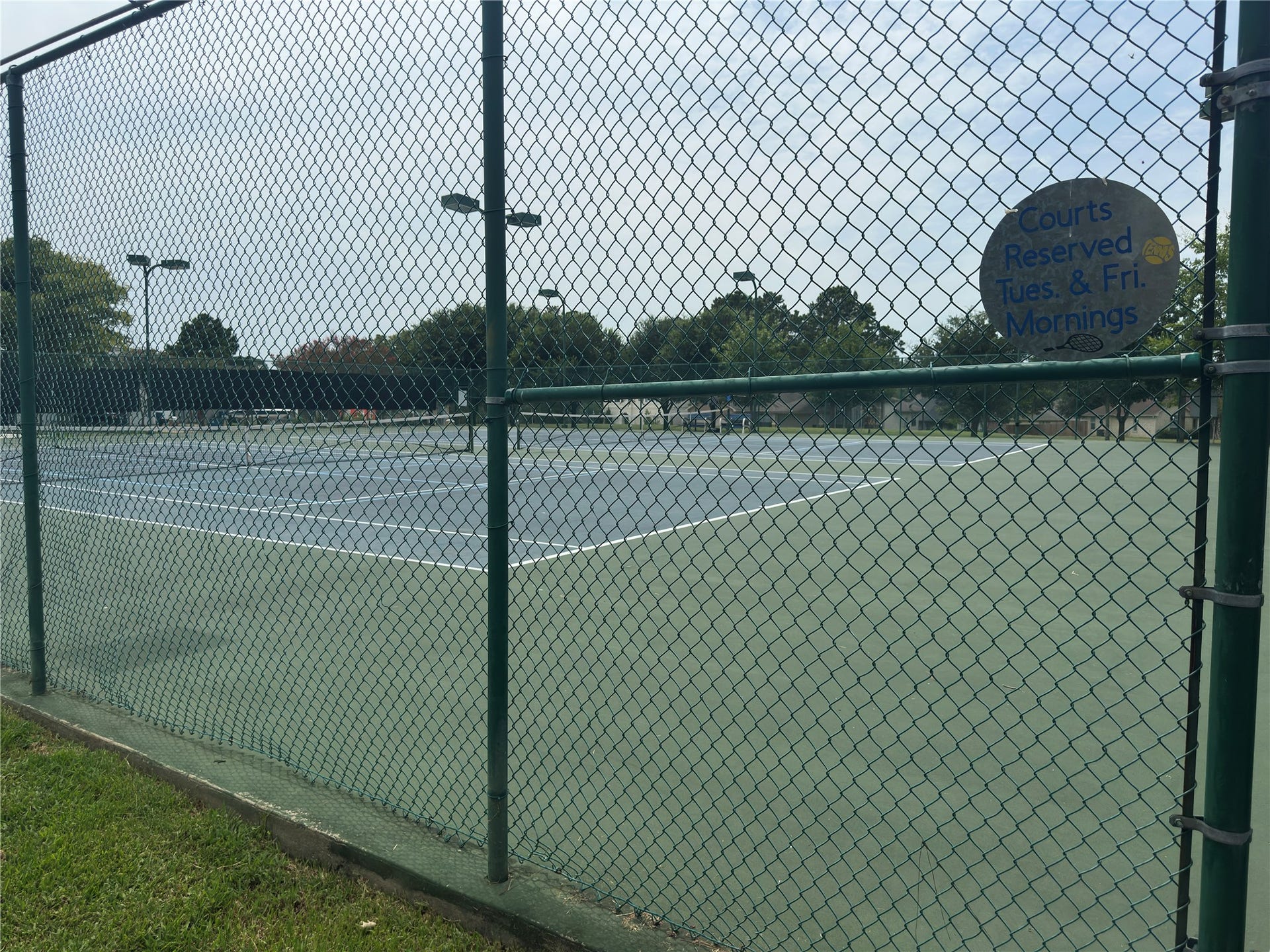 12830 Point Aquarius Boulevard, Willis, TX 77318 Tennis and Pickleball court with key card access and timer lights so you can play anytime of day.