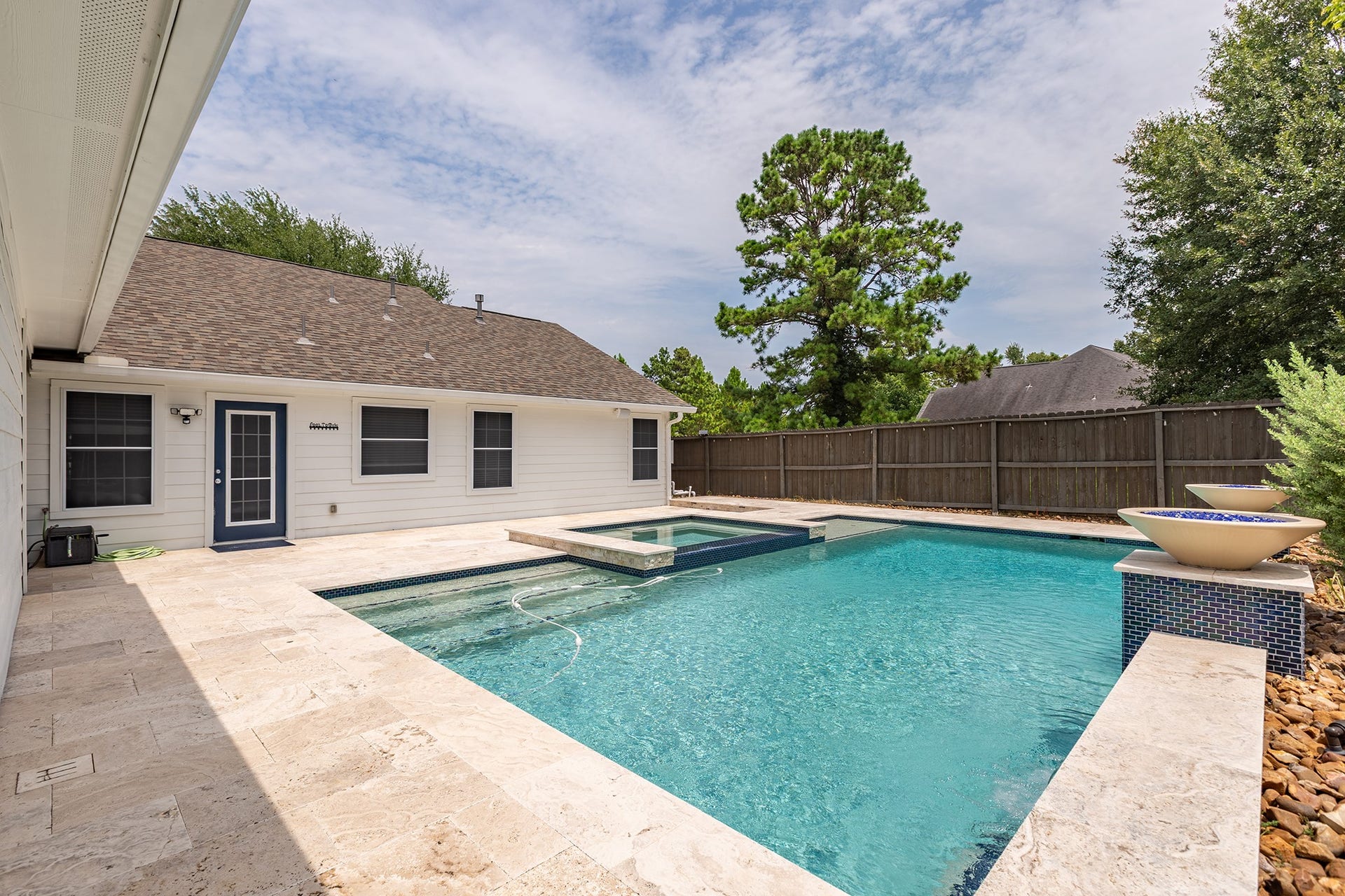 12830 Point Aquarius Boulevard, Willis, TX 77318 View of the pool showing the door leading to the living room.