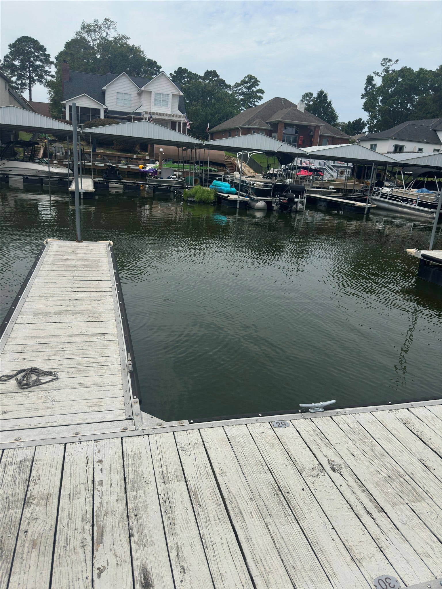 12830 Point Aquarius Boulevard, Willis, TX 77318 View of private boat slip included with monthly rent.