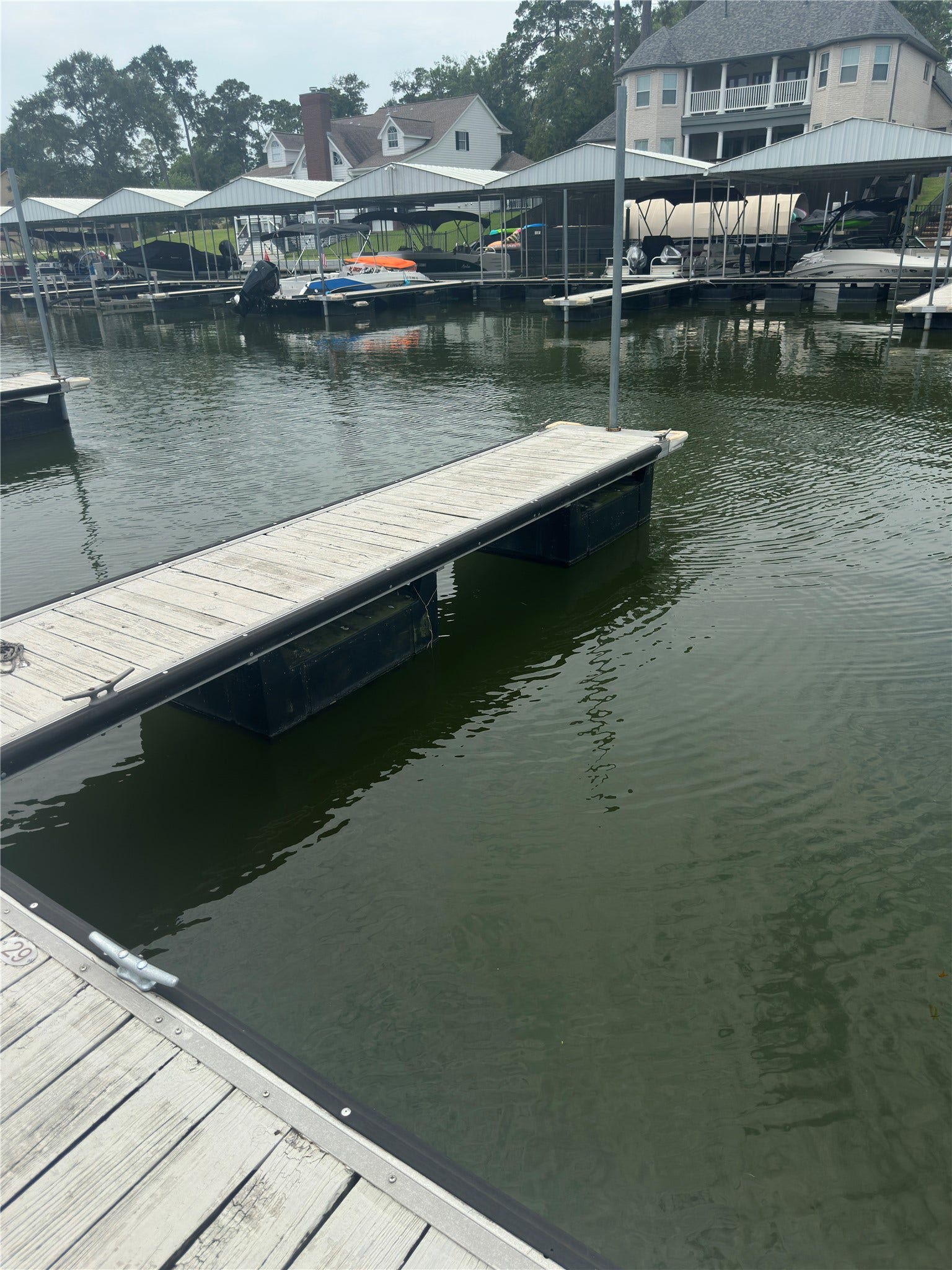 12830 Point Aquarius Boulevard, Willis, TX 77318 Private boat slip INCLUDED with the monthly rent. The boat slip is secured with key card access.
