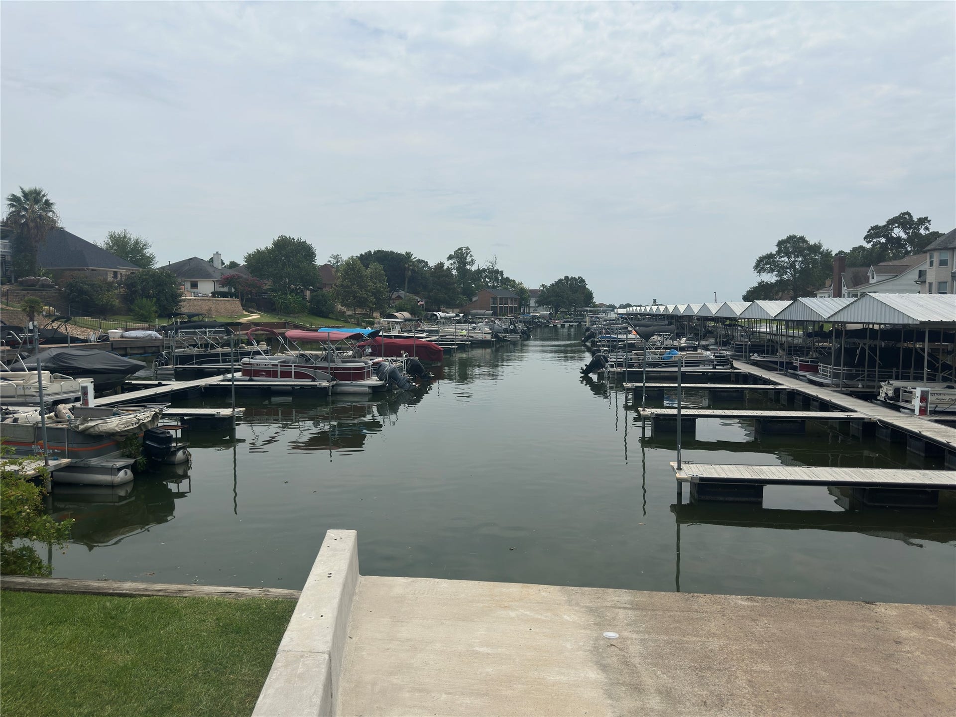 12830 Point Aquarius Boulevard, Willis, TX 77318 View of area you can store your boat at your private boat slip with access to boat ramp.