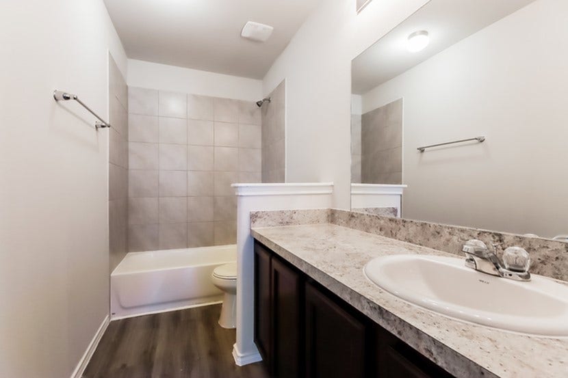 22350 Porter Mountain Lane, Porter, TX 77365 Photos may be representative of the floor plan and not the exact home. Finishes, layout, and features of the actual property for lease may vary.
