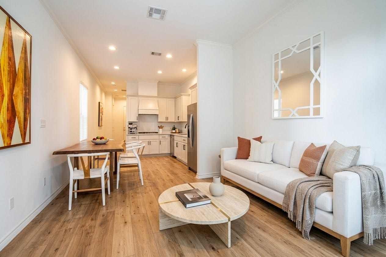 10ft ceilings for bright open living area and kitchen and wide plank flooring