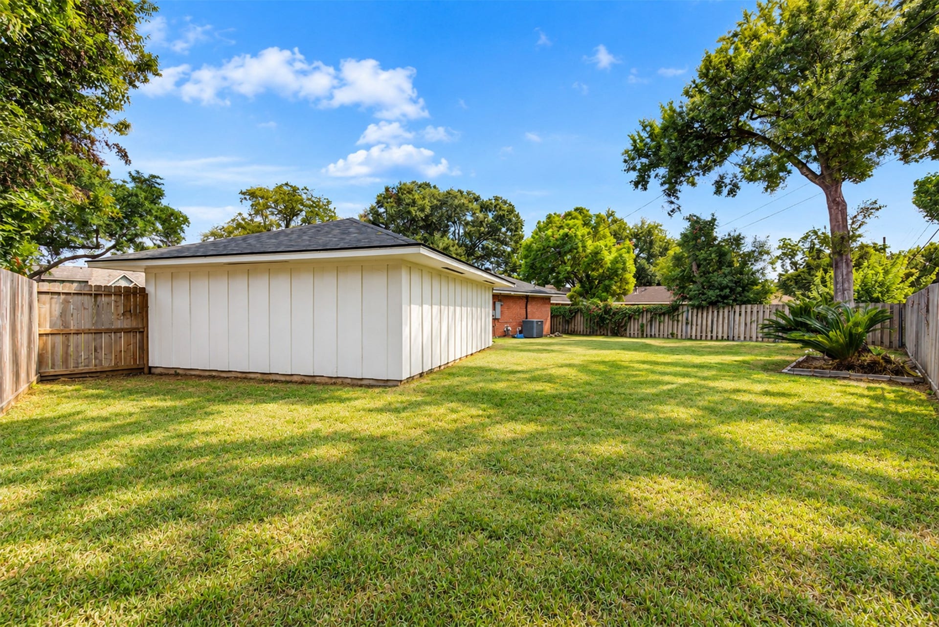 HERE'S ANOTHER VIEW OF THE LARGE SPACIOUS LOT