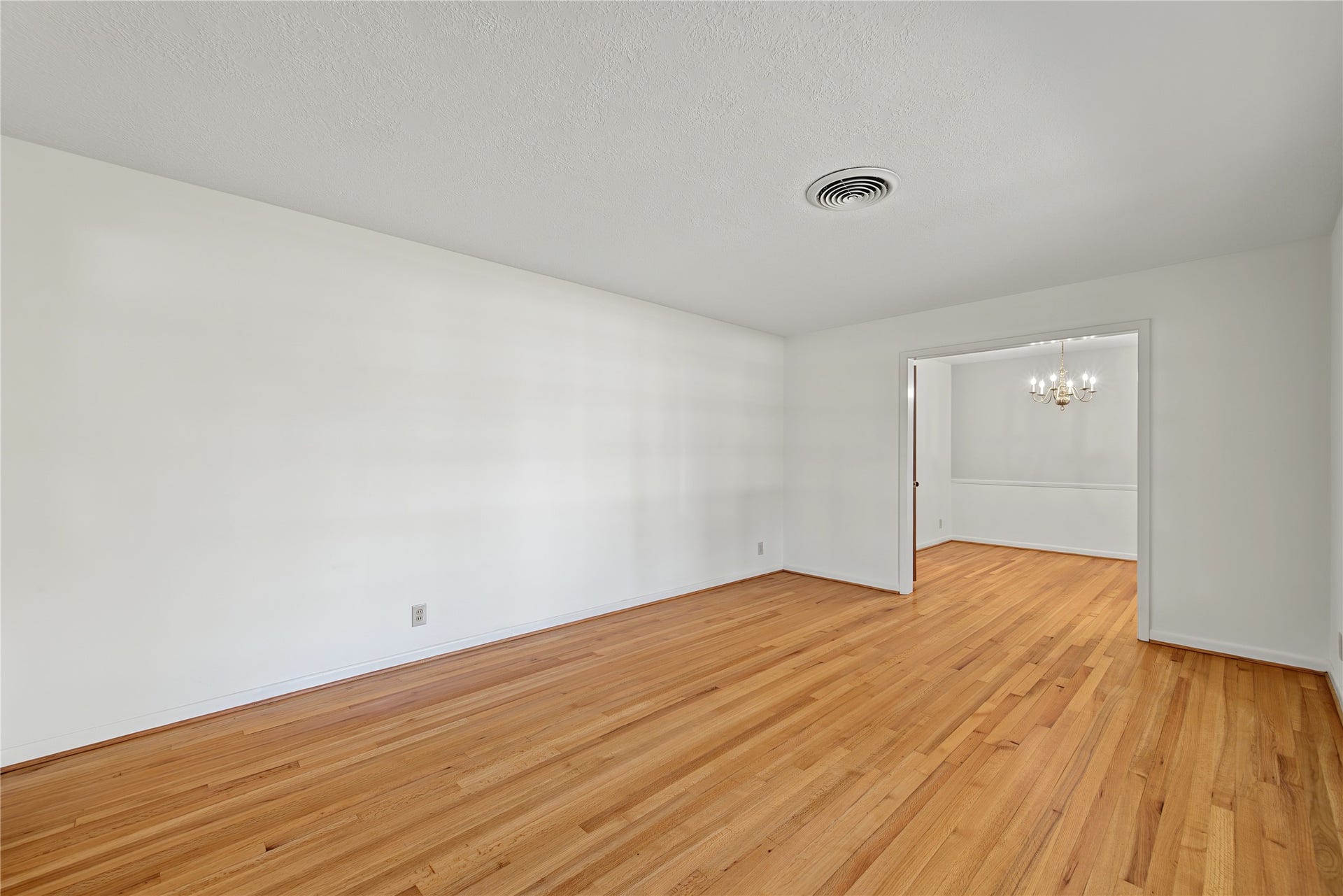 HERE'S ANOTHER VIEW OF THE FORMAL LIVING ROOM
