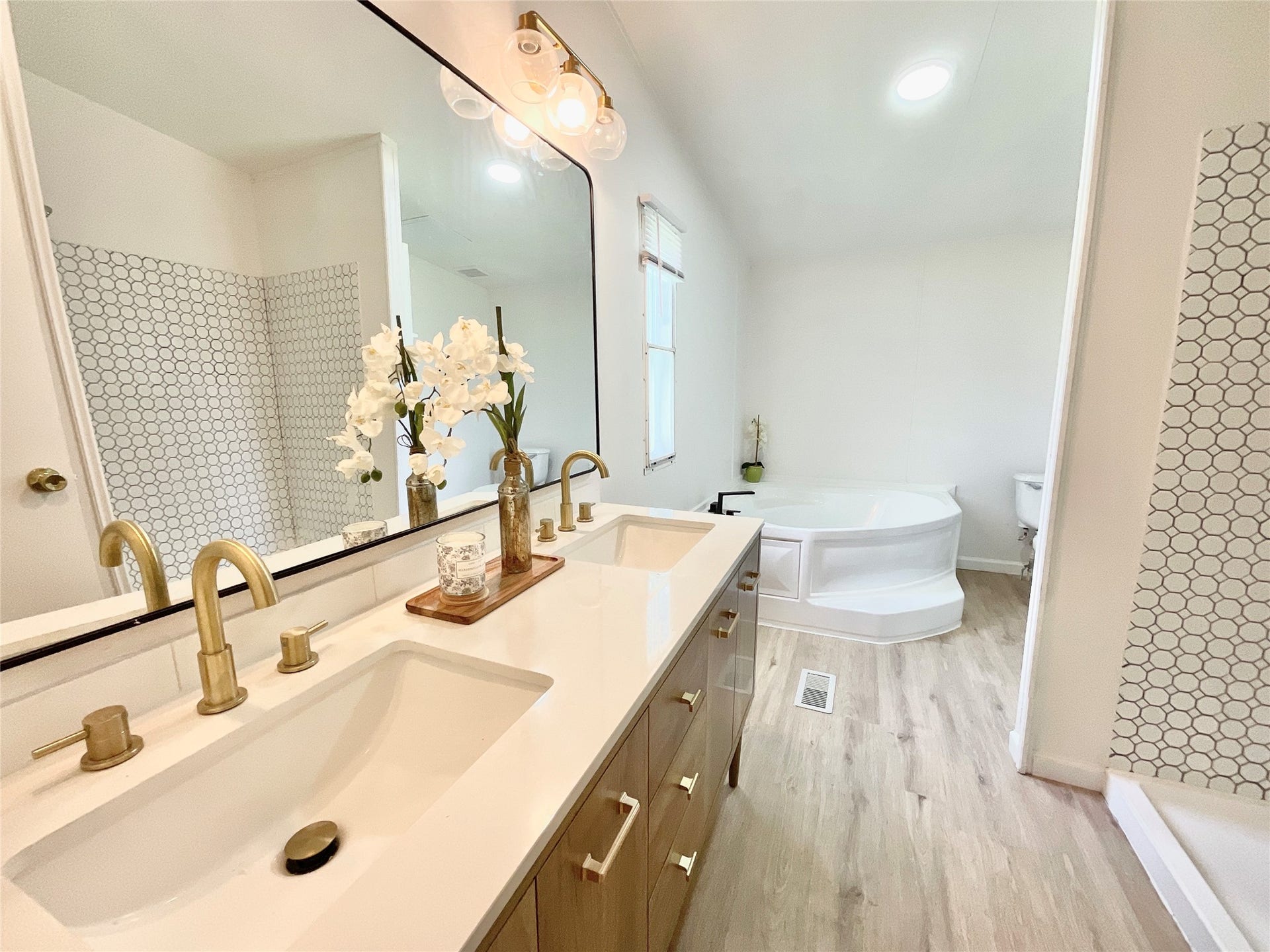 16544 Desert Star Drive, Conroe, TX 77302 Updated Primary Bathroom with New Designer Vanity, Mirror, Lighting & more
