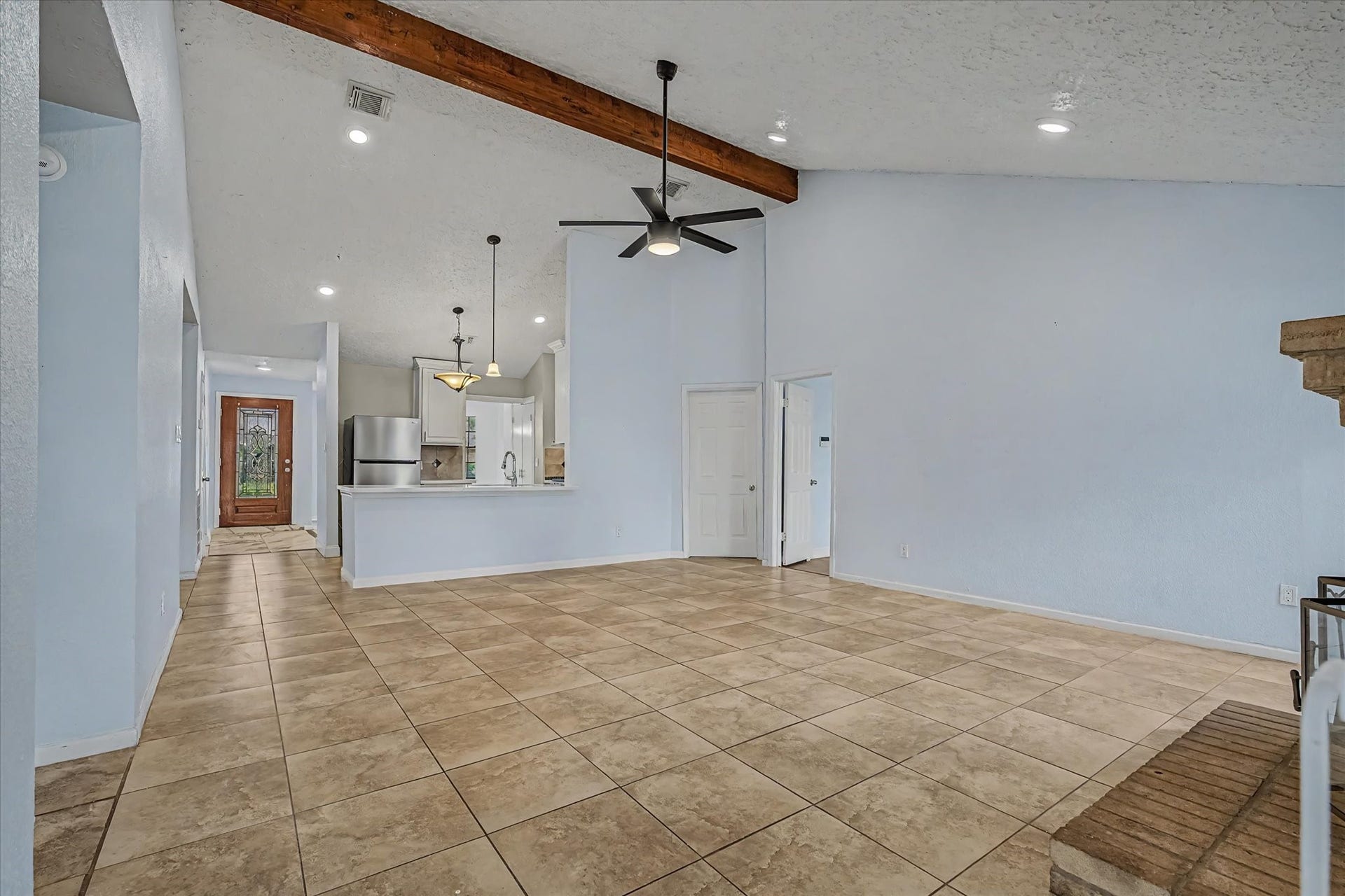 14218 Whitecross Drive, Houston, TX 77083 Recessed lighting to enhance the modern aesthetic and overall brightness of the home.