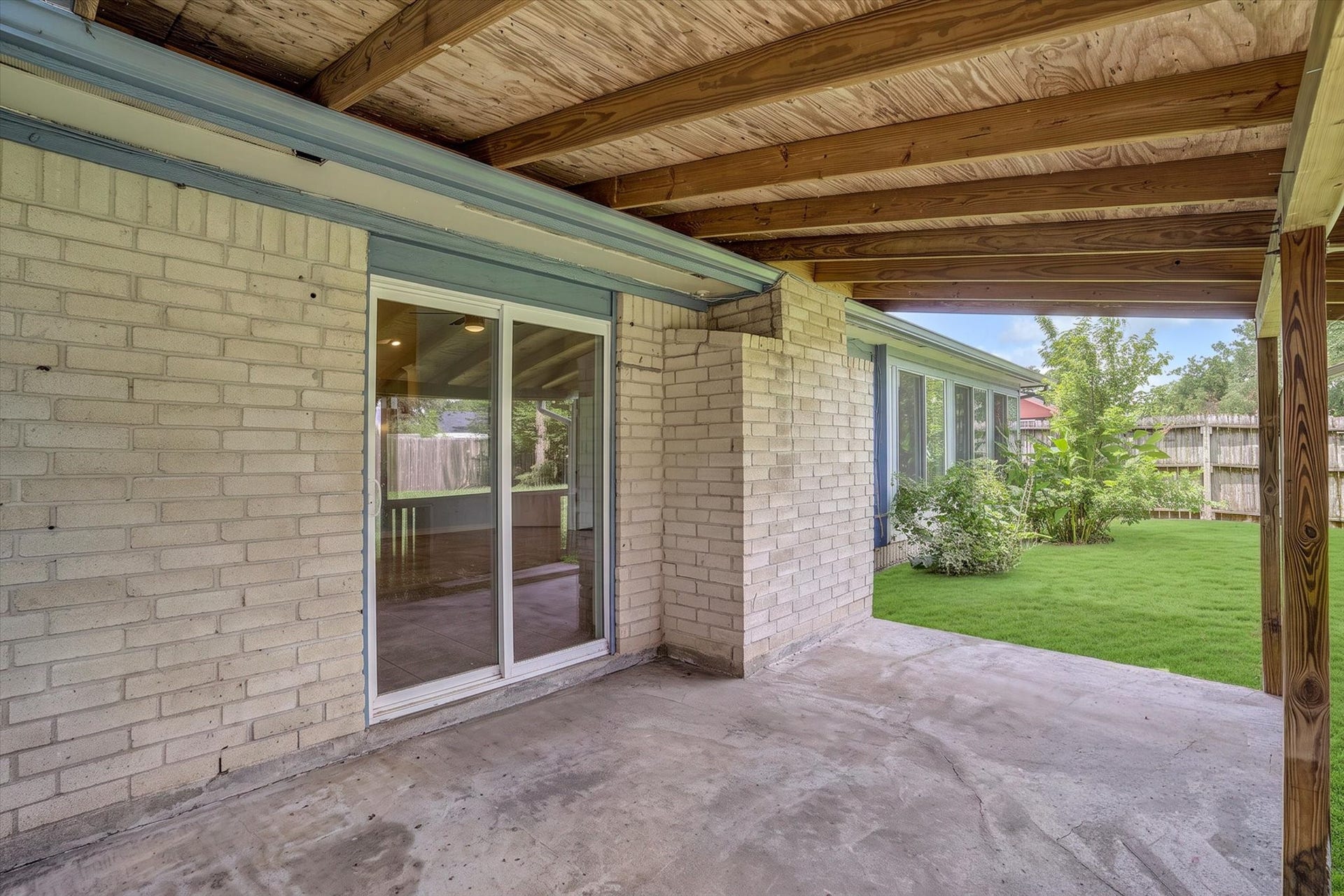 14218 Whitecross Drive, Houston, TX 77083 Expansive covered patio ideal for outdoor entertaining or peaceful morning relaxation.