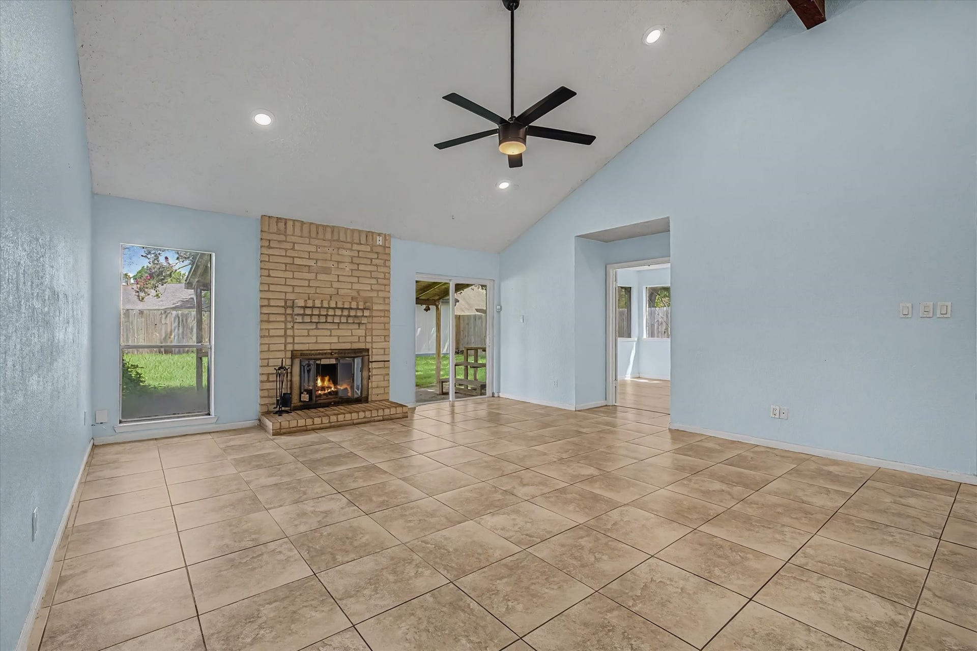 14218 Whitecross Drive, Houston, TX 77083 Brick wood burning fireplace