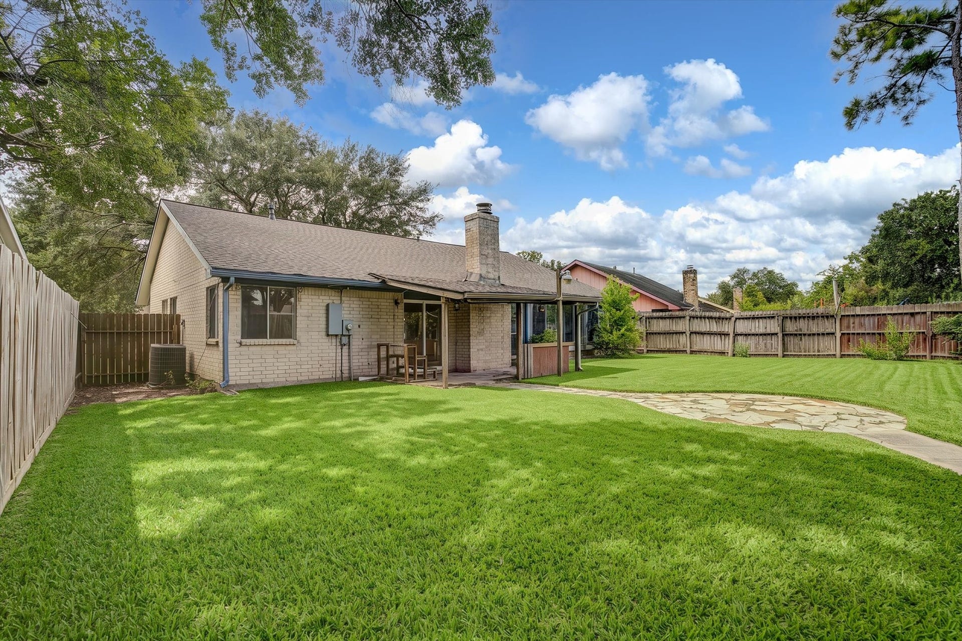 14218 Whitecross Drive, Houston, TX 77083 Massive backyard with stone walkway use your imagination
