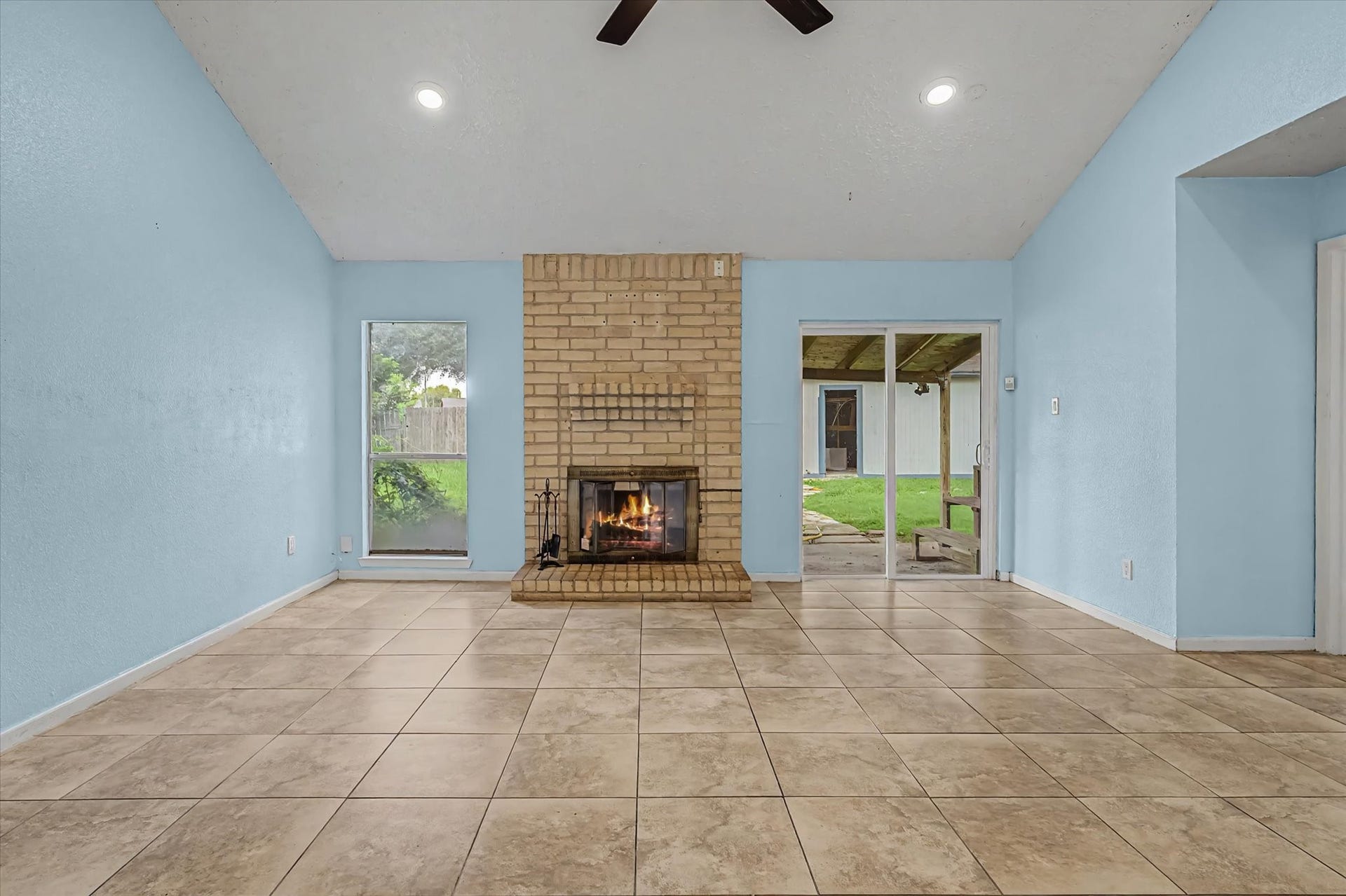 14218 Whitecross Drive, Houston, TX 77083 View of the sliding glass door leading to the covered patio.
