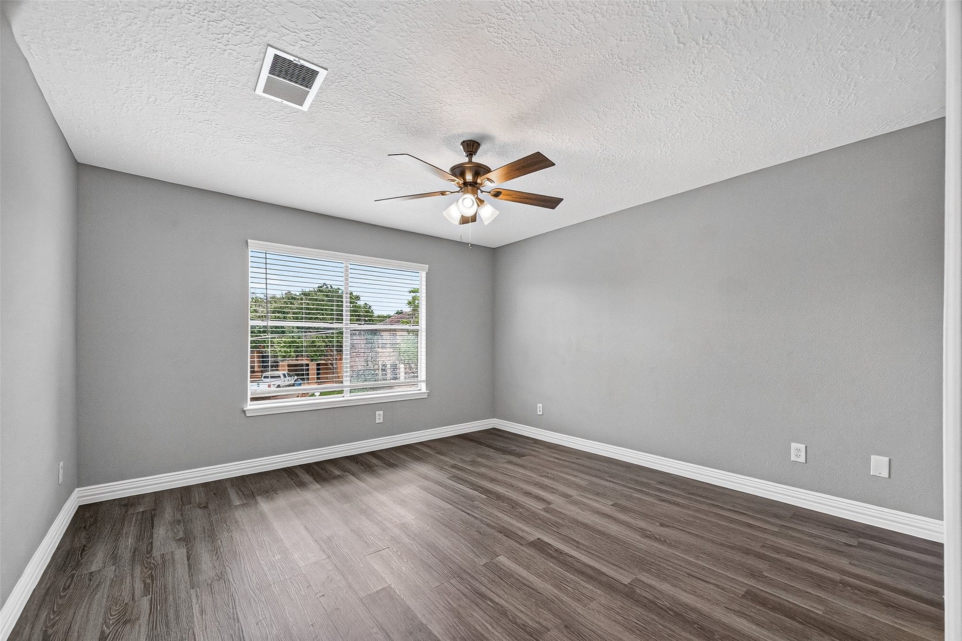 2034 Glencove Drive, Seabrook, TX 77586 Bedroom with a large window and fresh neutral paint