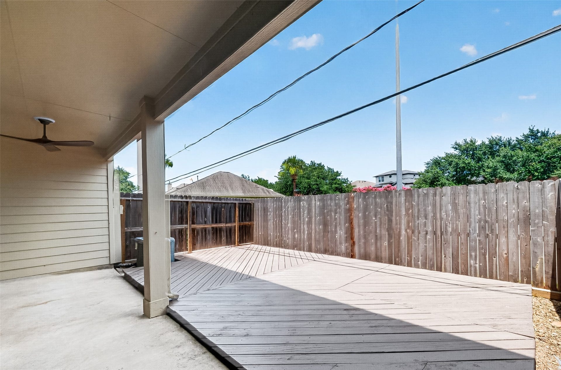 2034 Glencove Drive, Seabrook, TX 77586 Covered patio overlooks the fenced backyard