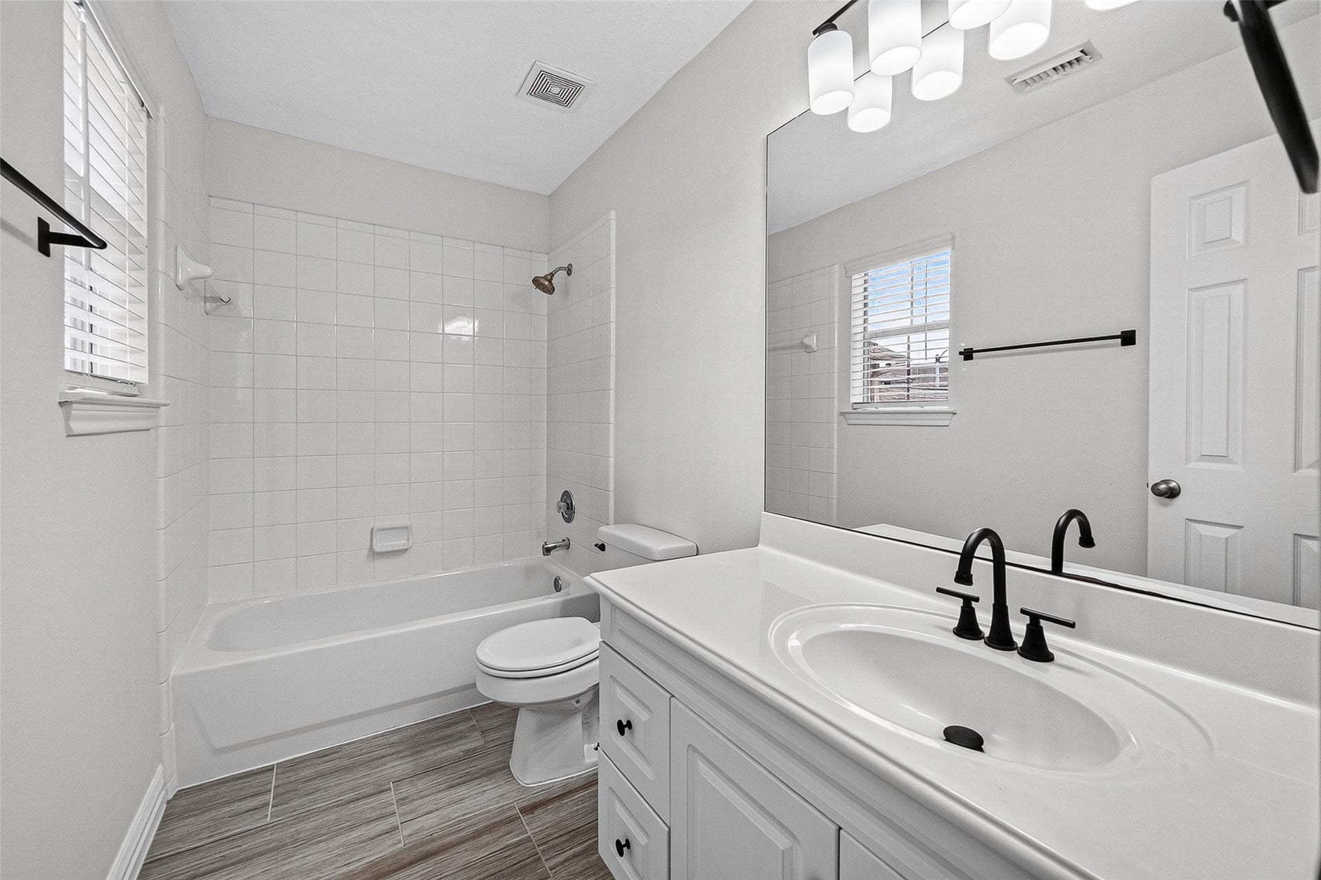 2034 Glencove Drive, Seabrook, TX 77586 Bathroom with updated vanity and modern black fixtures