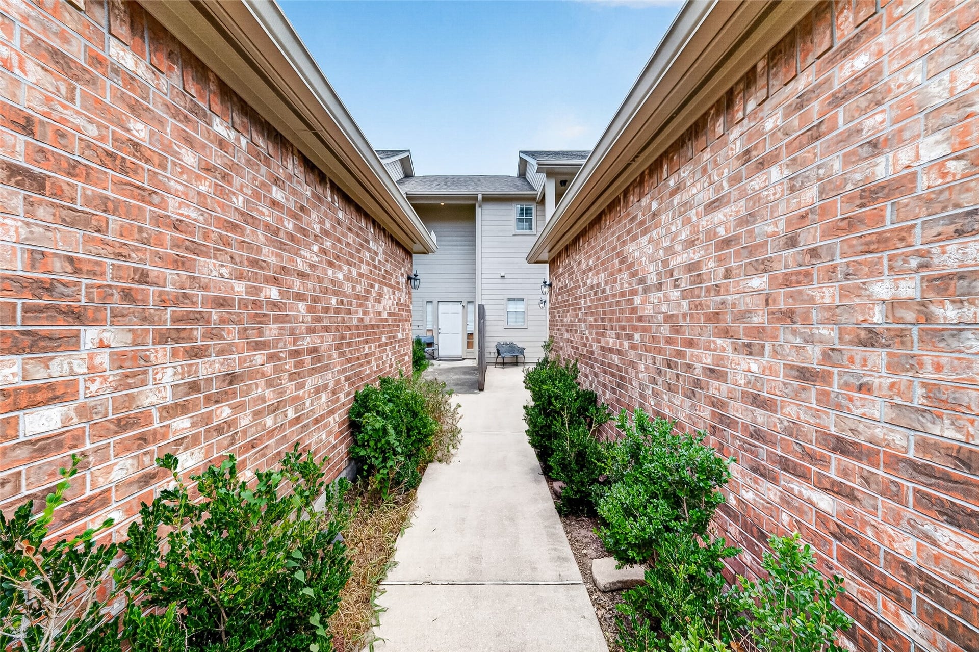 2034 Glencove Drive, Seabrook, TX 77586 Private, landscaped walkway leads to the front entry
