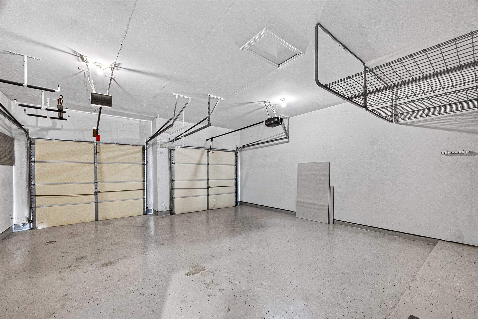 2034 Glencove Drive, Seabrook, TX 77586 Garage with overhead storage racks for extra space